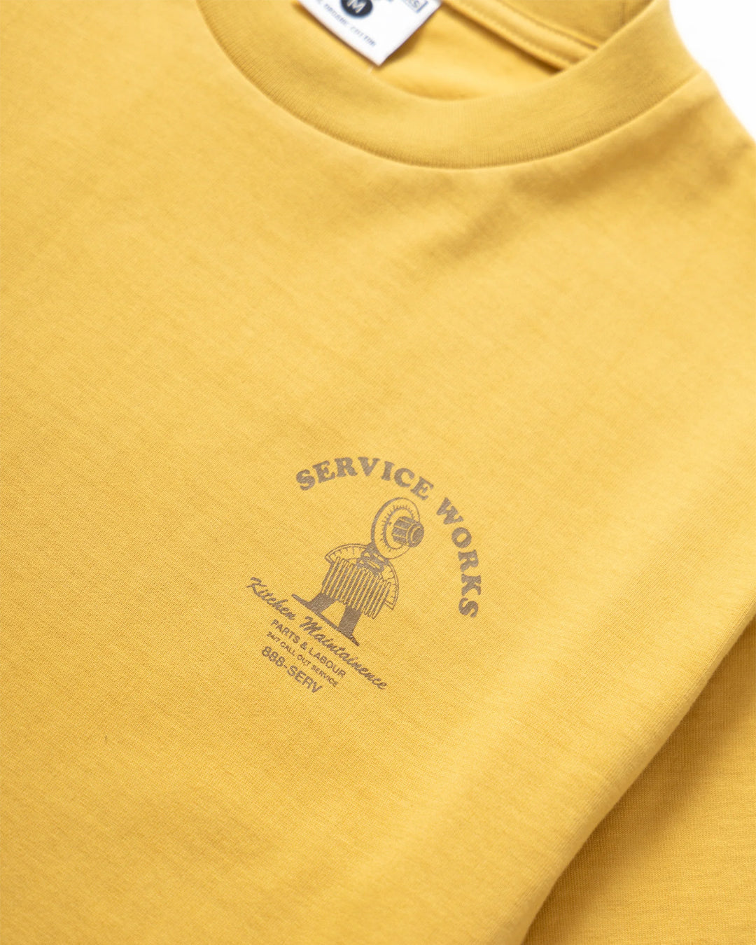 A Eckhaus Latta Shirt pictured on a model in front of a white background. The title of the product is Eckhaus Latta Eclipse Turtleneck - Stone and the image was taken by 199A®.