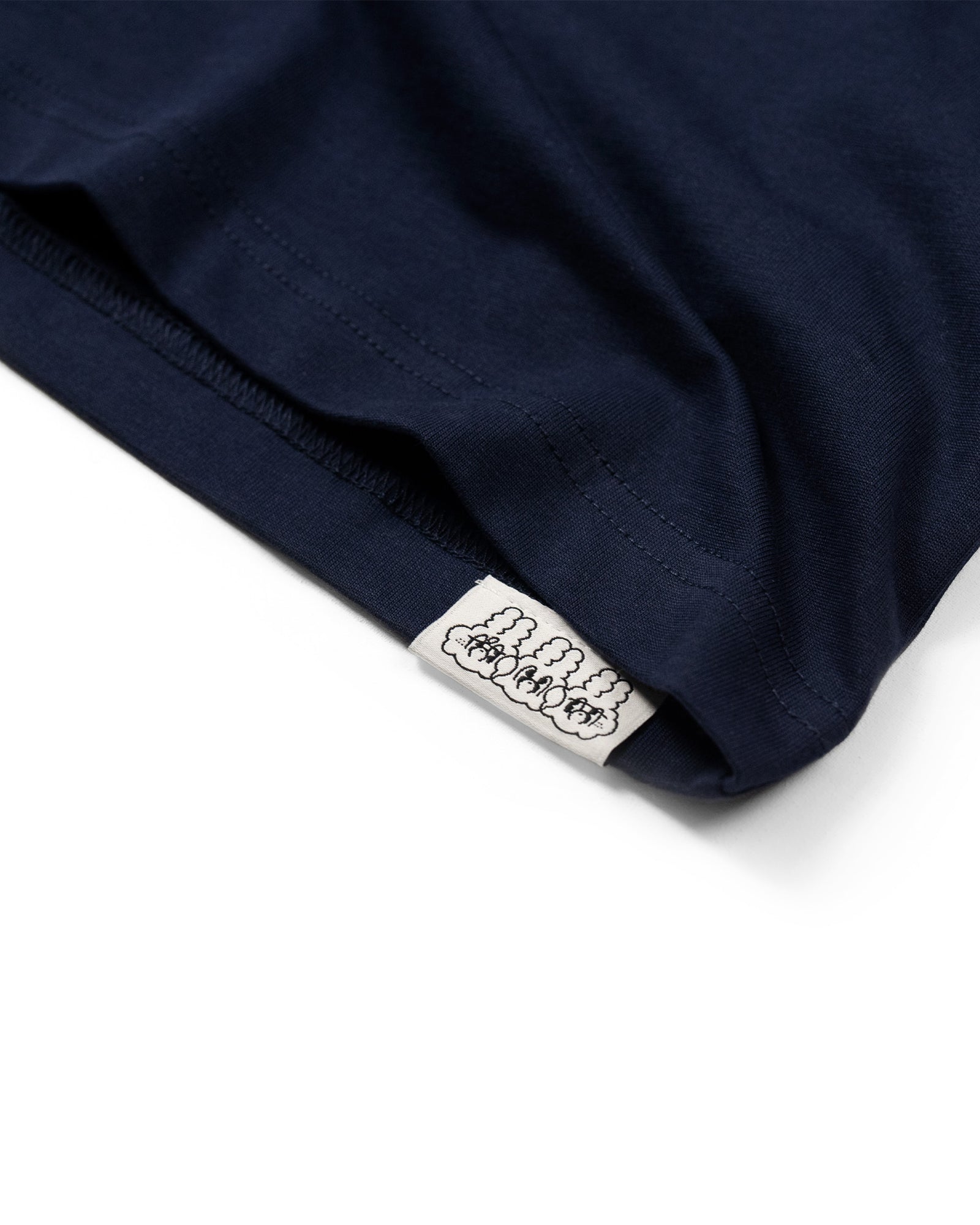 A Eckhaus Latta Shirt pictured on a model in front of a white background. The title of the product is Eckhaus Latta Eclipse Turtleneck - Stone and the image was taken by 199A®.