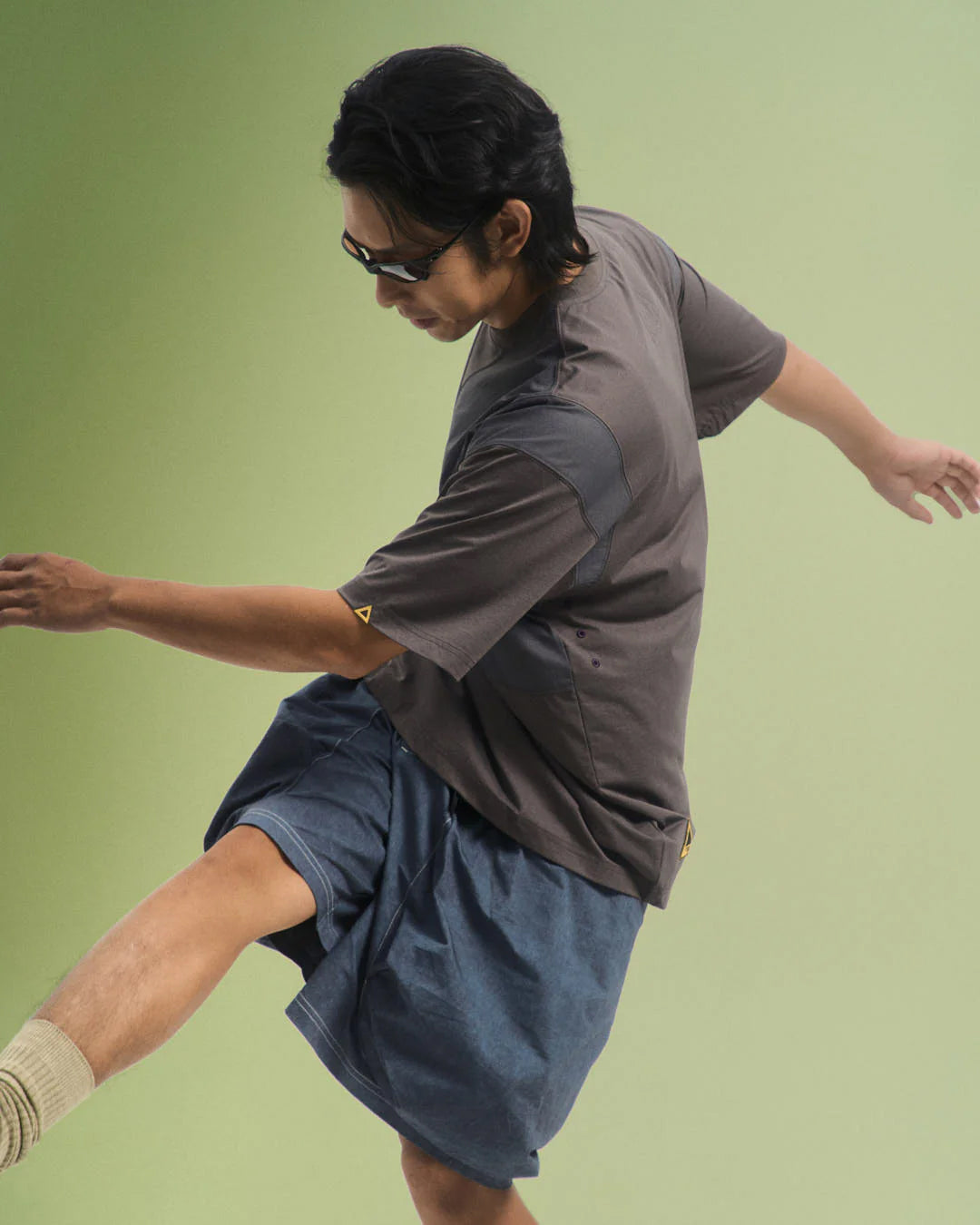 A Eckhaus Latta Shirt pictured on a model in front of a white background. The title of the product is Eckhaus Latta Eclipse Turtleneck - Stone and the image was taken by 199A®.