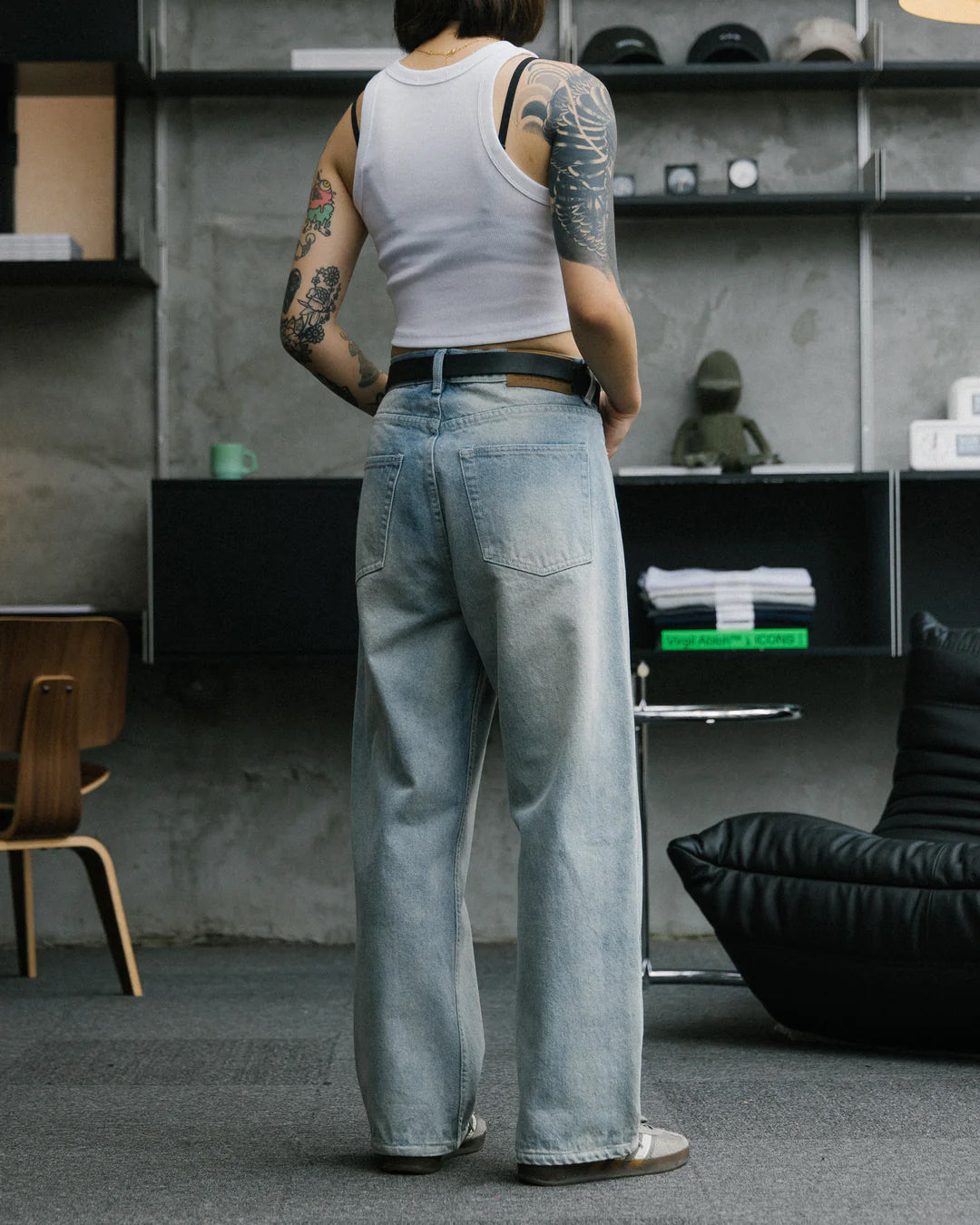 A Eckhaus Latta Shirt pictured on a model in front of a white background. The title of the product is Eckhaus Latta Eclipse Turtleneck - Stone and the image was taken by 199A®.