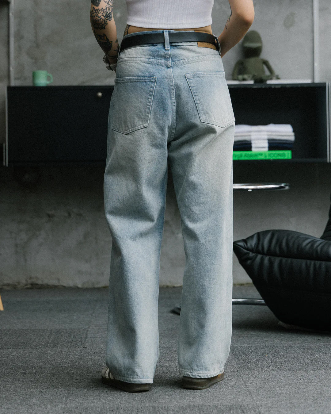 A Eckhaus Latta Shirt pictured on a model in front of a white background. The title of the product is Eckhaus Latta Eclipse Turtleneck - Stone and the image was taken by 199A®.