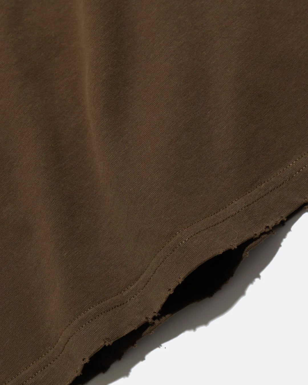 A Eckhaus Latta Shirt pictured on a model in front of a white background. The title of the product is Eckhaus Latta Eclipse Turtleneck - Stone and the image was taken by 199A®.