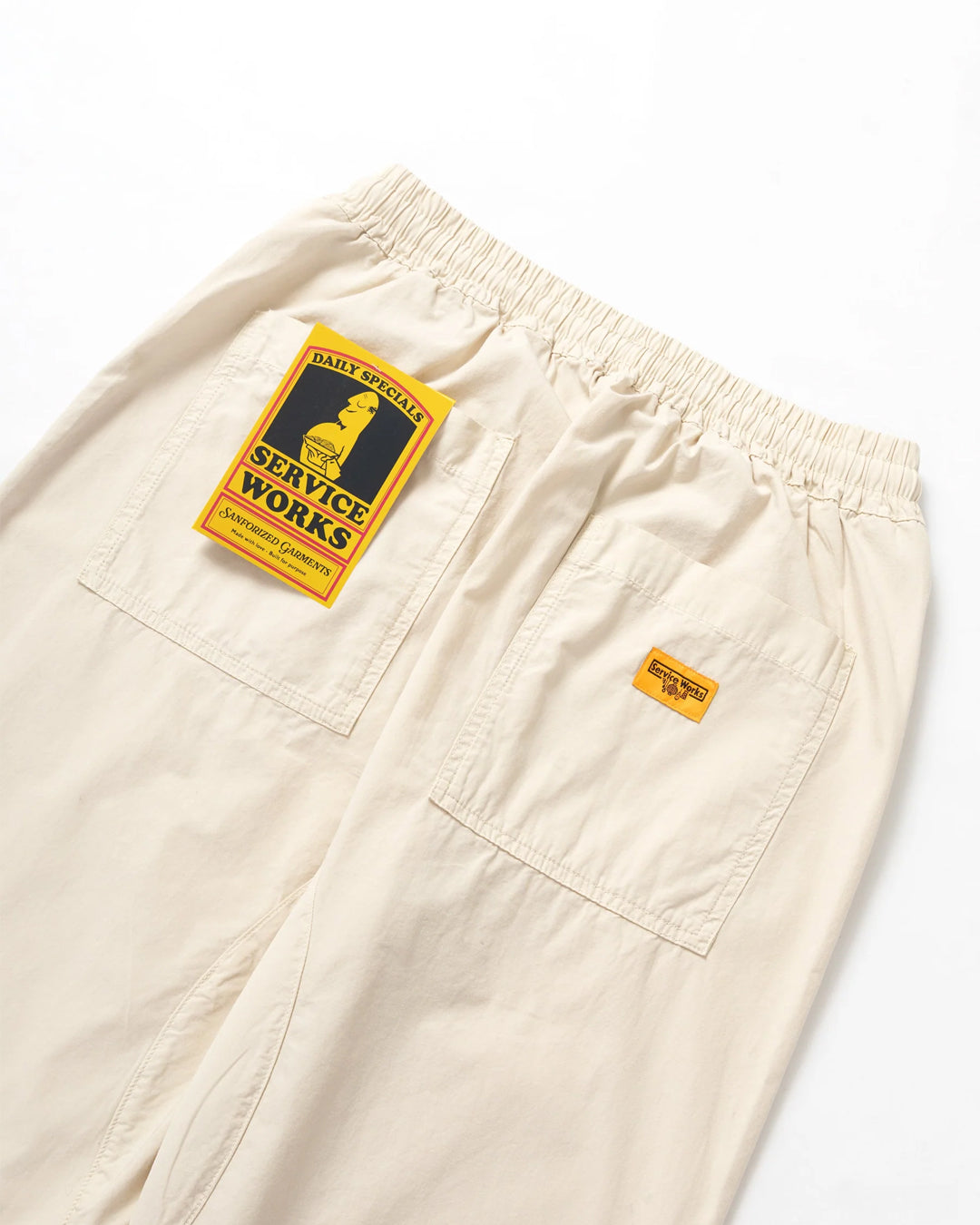 A Eckhaus Latta Shirt pictured on a model in front of a white background. The title of the product is Eckhaus Latta Eclipse Turtleneck - Stone and the image was taken by 199A®.