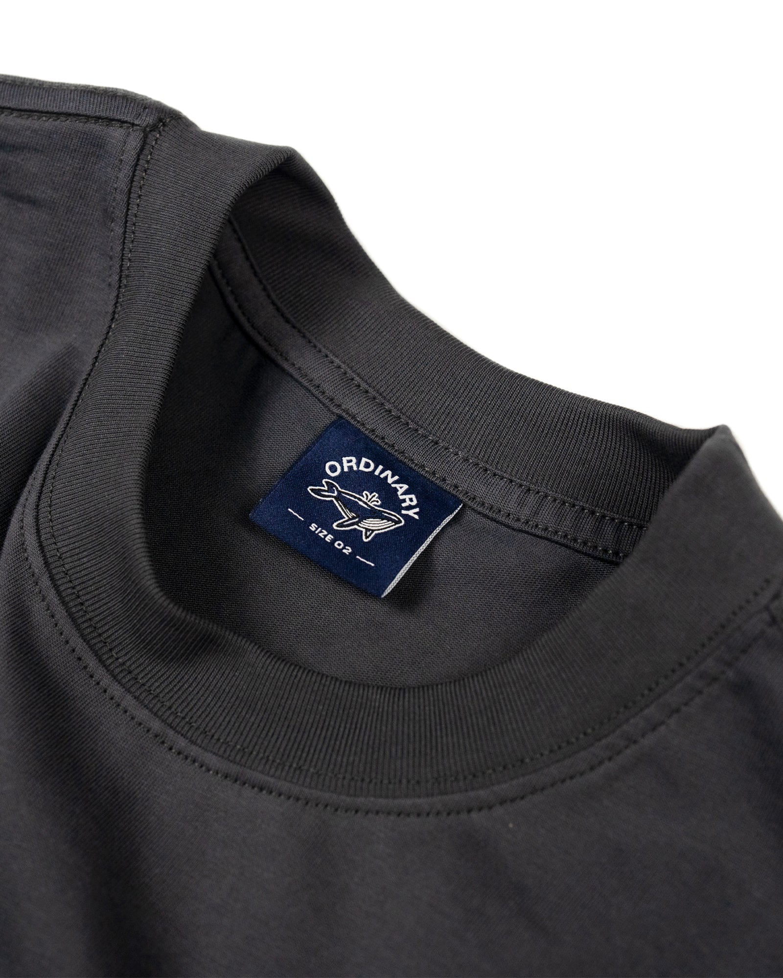 A Eckhaus Latta Shirt pictured on a model in front of a white background. The title of the product is Eckhaus Latta Eclipse Turtleneck - Stone and the image was taken by 199A®.