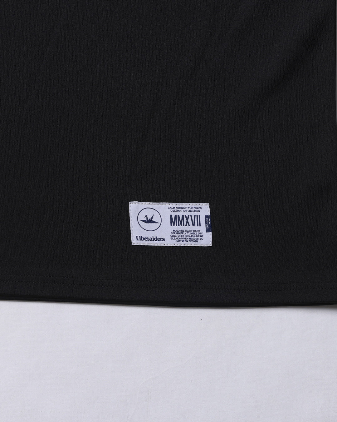 A Eckhaus Latta Shirt pictured on a model in front of a white background. The title of the product is Eckhaus Latta Eclipse Turtleneck - Stone and the image was taken by 199A®.