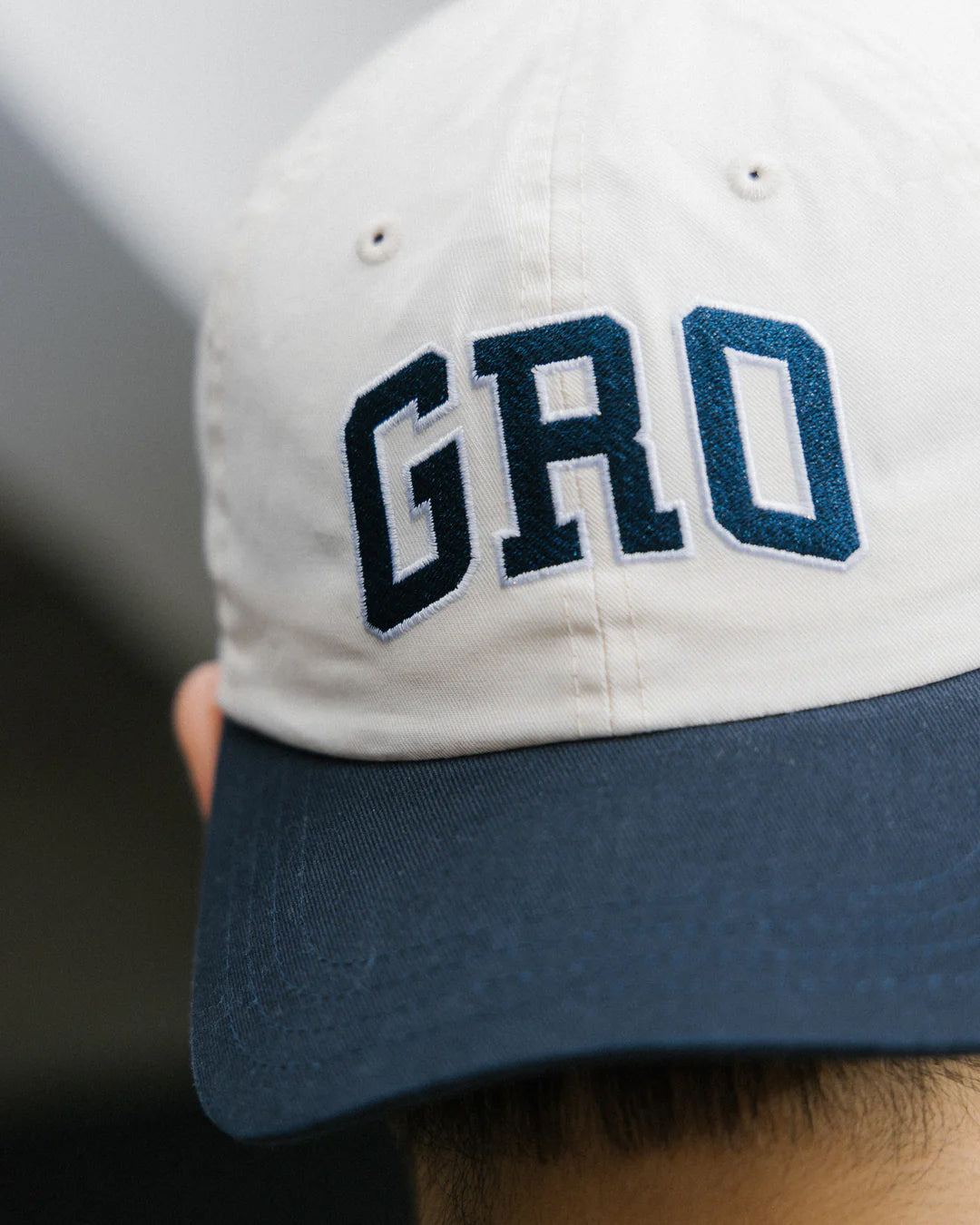 A Eckhaus Latta Shirt pictured on a model in front of a white background. The title of the product is Eckhaus Latta Eclipse Turtleneck - Stone and the image was taken by 199A®.