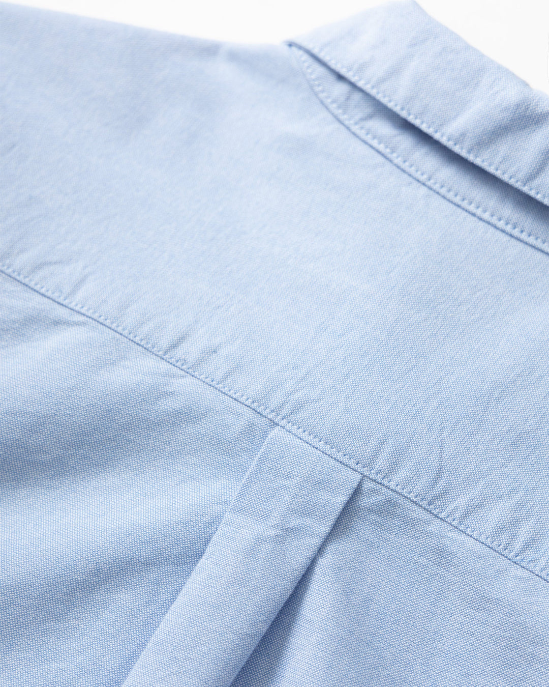 A Eckhaus Latta Shirt pictured on a model in front of a white background. The title of the product is Eckhaus Latta Eclipse Turtleneck - Stone and the image was taken by 199A®.