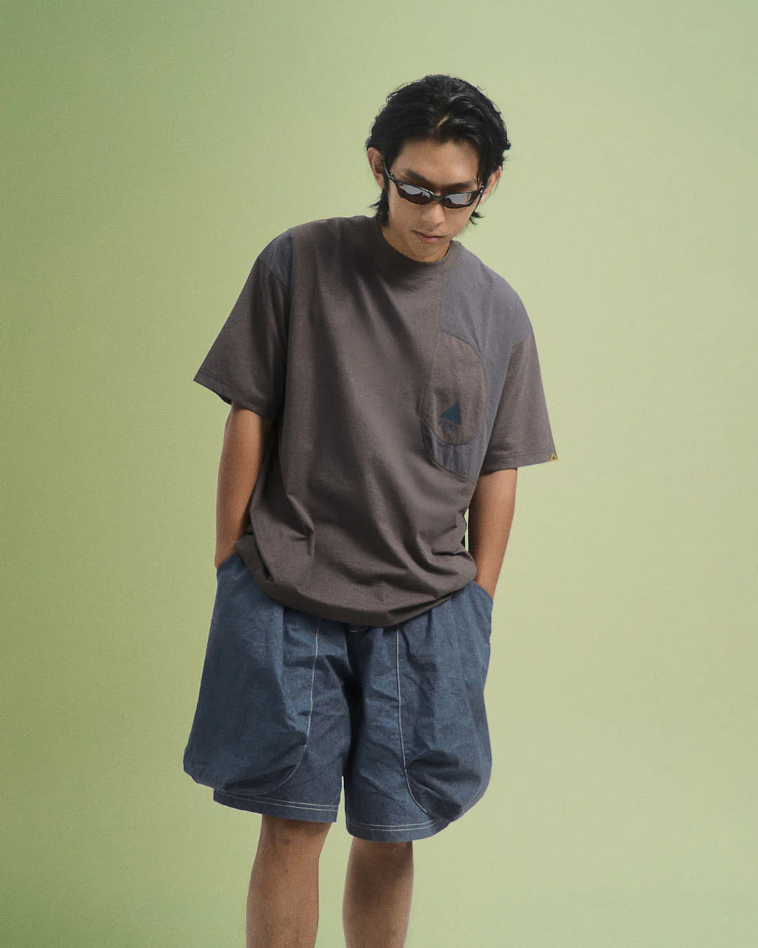 A Eckhaus Latta Shirt pictured on a model in front of a white background. The title of the product is Eckhaus Latta Eclipse Turtleneck - Stone and the image was taken by 199A®.