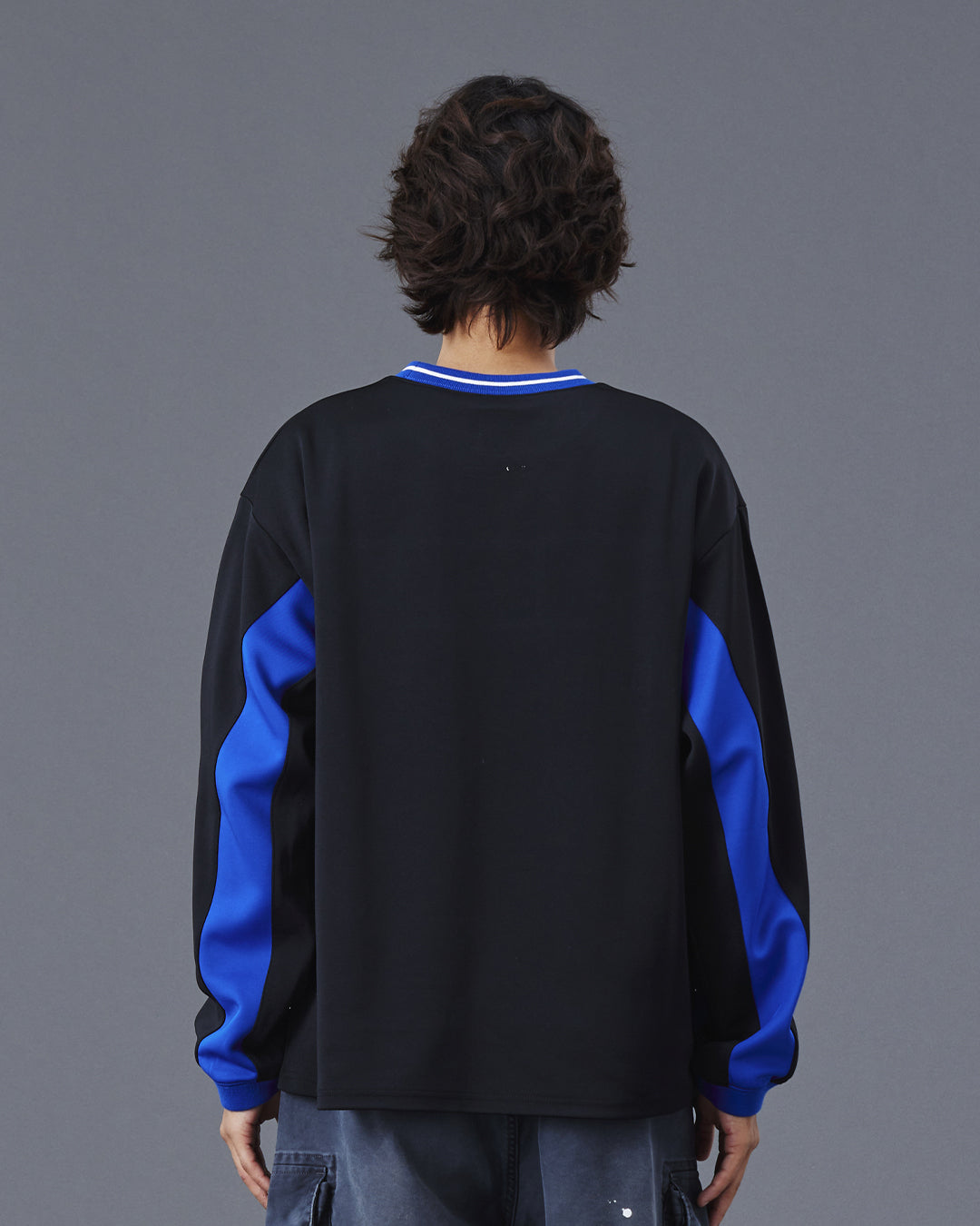 A Eckhaus Latta Shirt pictured on a model in front of a white background. The title of the product is Eckhaus Latta Eclipse Turtleneck - Stone and the image was taken by 199A®.