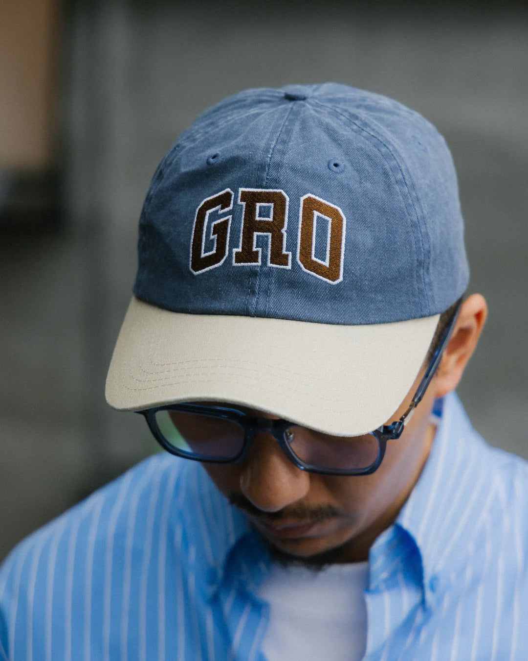 A Eckhaus Latta Shirt pictured on a model in front of a white background. The title of the product is Eckhaus Latta Eclipse Turtleneck - Stone and the image was taken by 199A®.
