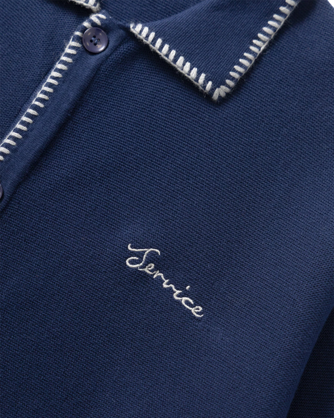 A Eckhaus Latta Shirt pictured on a model in front of a white background. The title of the product is Eckhaus Latta Eclipse Turtleneck - Stone and the image was taken by 199A®.