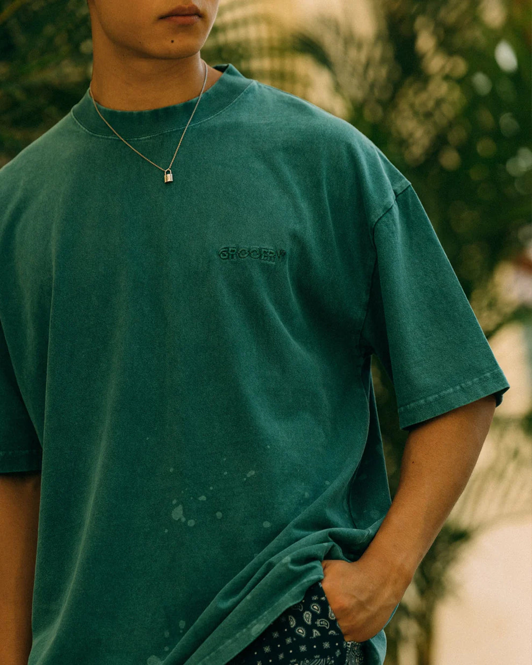 A Eckhaus Latta Shirt pictured on a model in front of a white background. The title of the product is Eckhaus Latta Eclipse Turtleneck - Stone and the image was taken by 199A®.