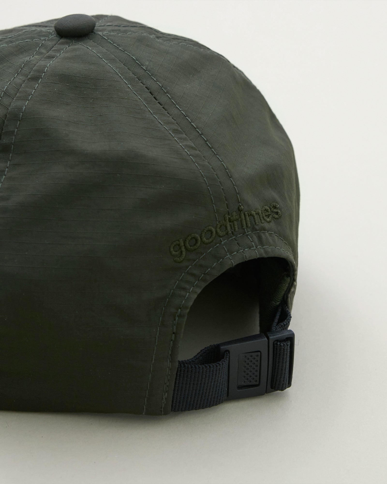 A Eckhaus Latta Shirt pictured on a model in front of a white background. The title of the product is Eckhaus Latta Eclipse Turtleneck - Stone and the image was taken by 199A®.