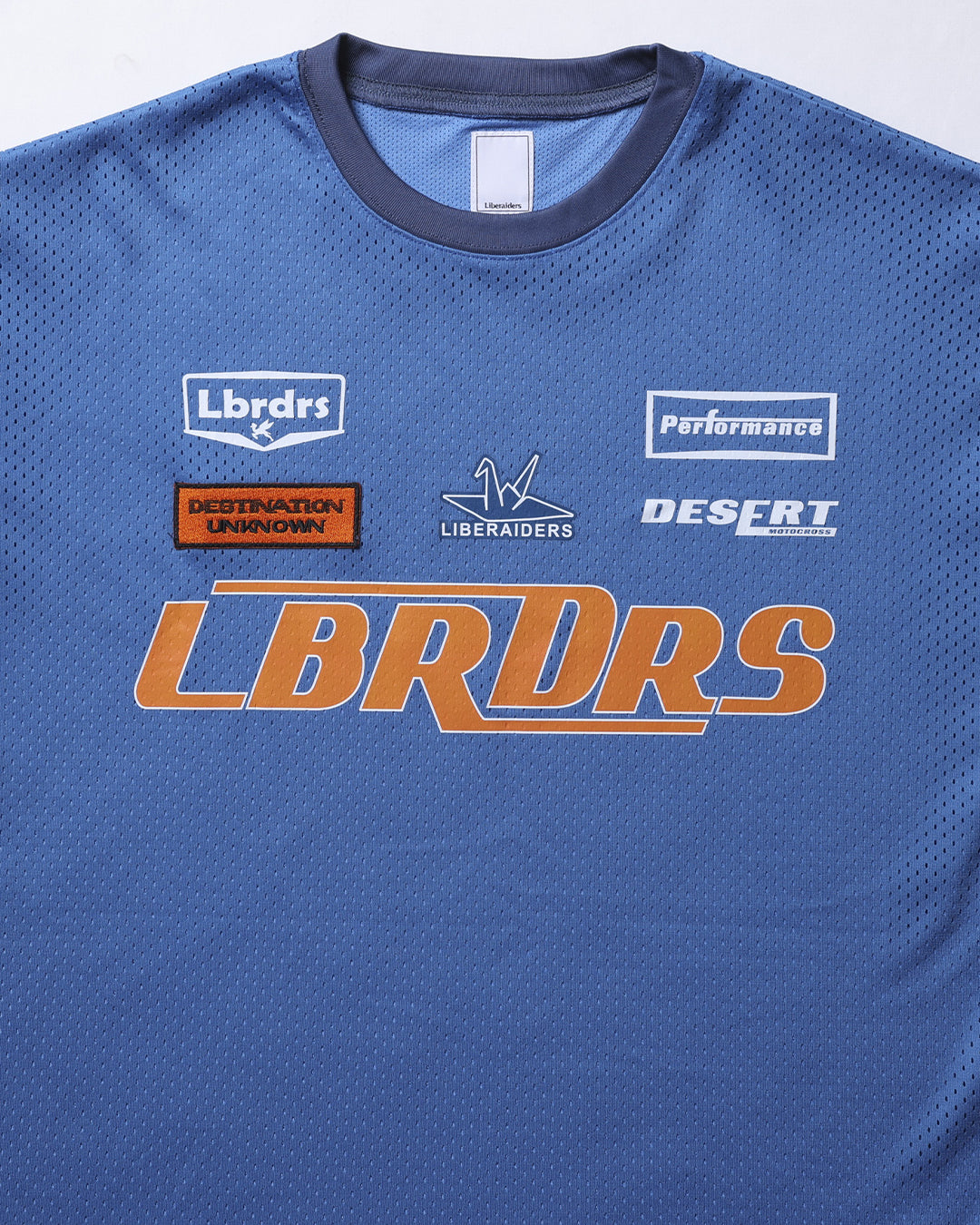 A Eckhaus Latta Shirt pictured on a model in front of a white background. The title of the product is Eckhaus Latta Eclipse Turtleneck - Stone and the image was taken by 199A®.