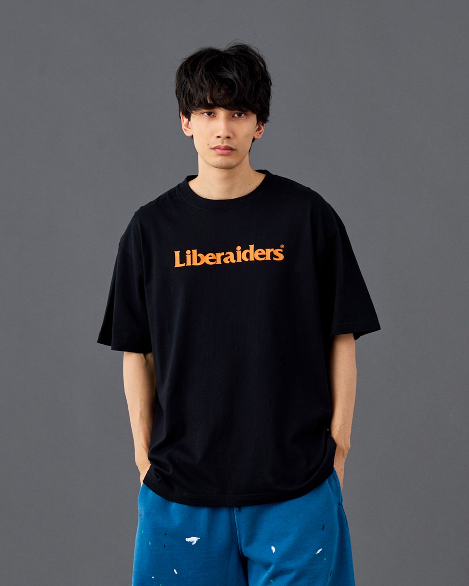 A Eckhaus Latta Shirt pictured on a model in front of a white background. The title of the product is Eckhaus Latta Eclipse Turtleneck - Stone and the image was taken by 199A®.