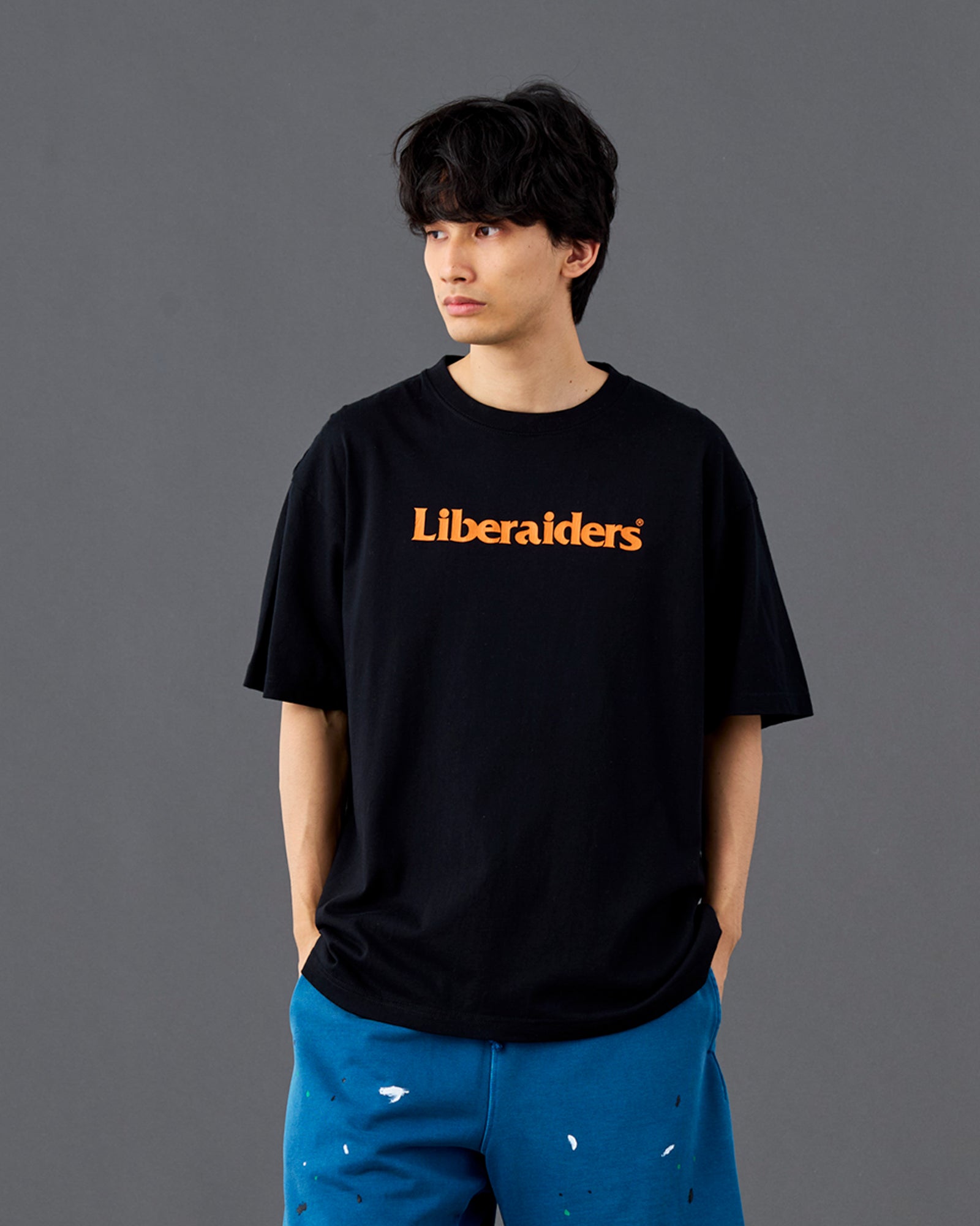 A Eckhaus Latta Shirt pictured on a model in front of a white background. The title of the product is Eckhaus Latta Eclipse Turtleneck - Stone and the image was taken by 199A®.