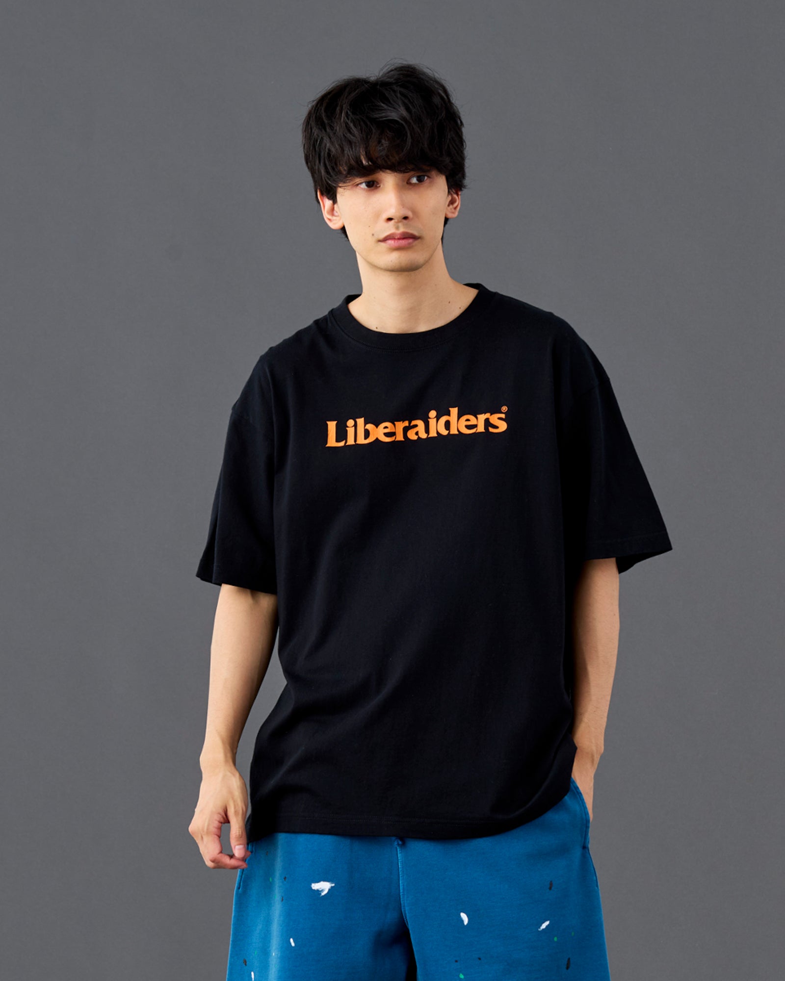 A Eckhaus Latta Shirt pictured on a model in front of a white background. The title of the product is Eckhaus Latta Eclipse Turtleneck - Stone and the image was taken by 199A®.