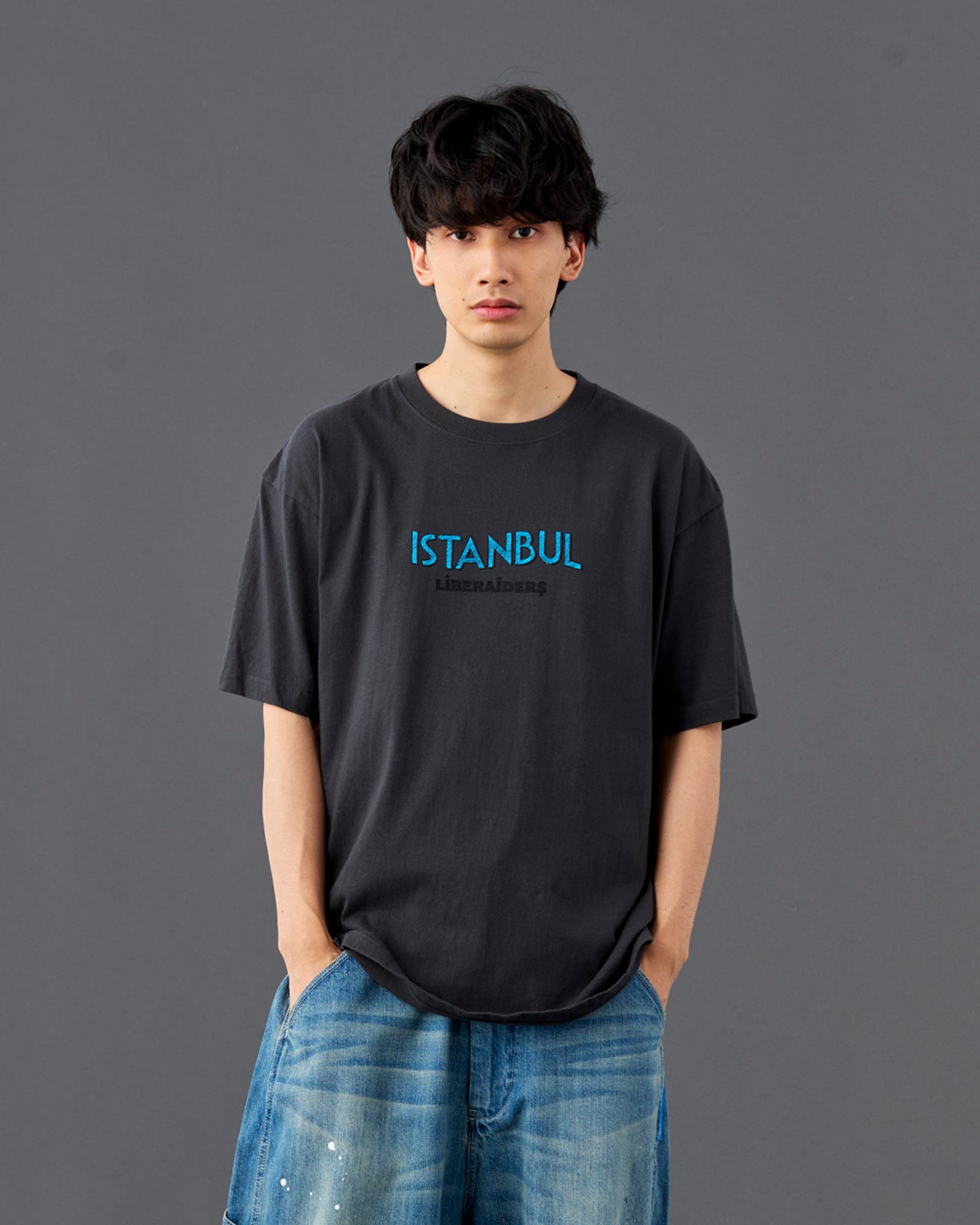 A Eckhaus Latta Shirt pictured on a model in front of a white background. The title of the product is Eckhaus Latta Eclipse Turtleneck - Stone and the image was taken by 199A®.