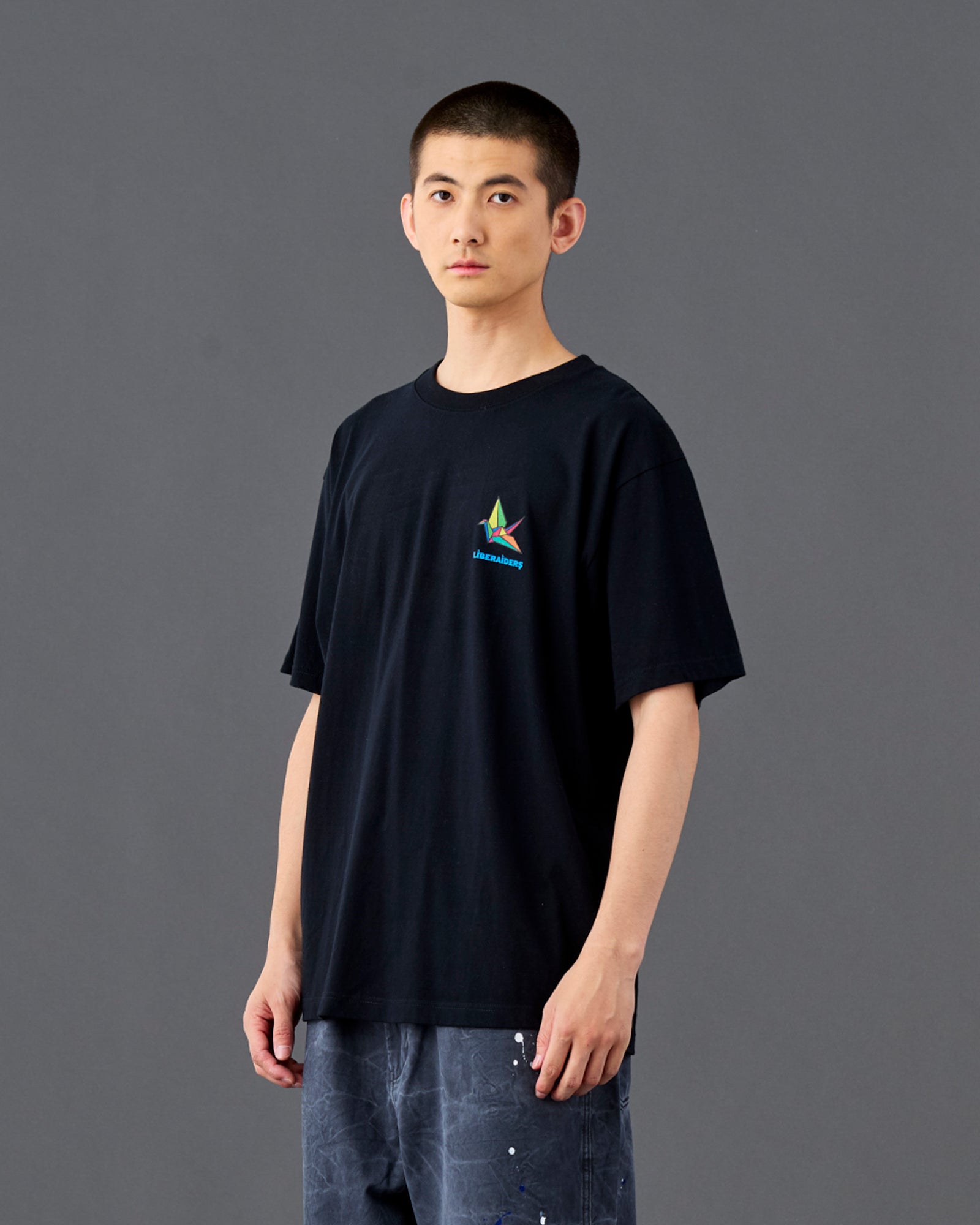 A Eckhaus Latta Shirt pictured on a model in front of a white background. The title of the product is Eckhaus Latta Eclipse Turtleneck - Stone and the image was taken by 199A®.