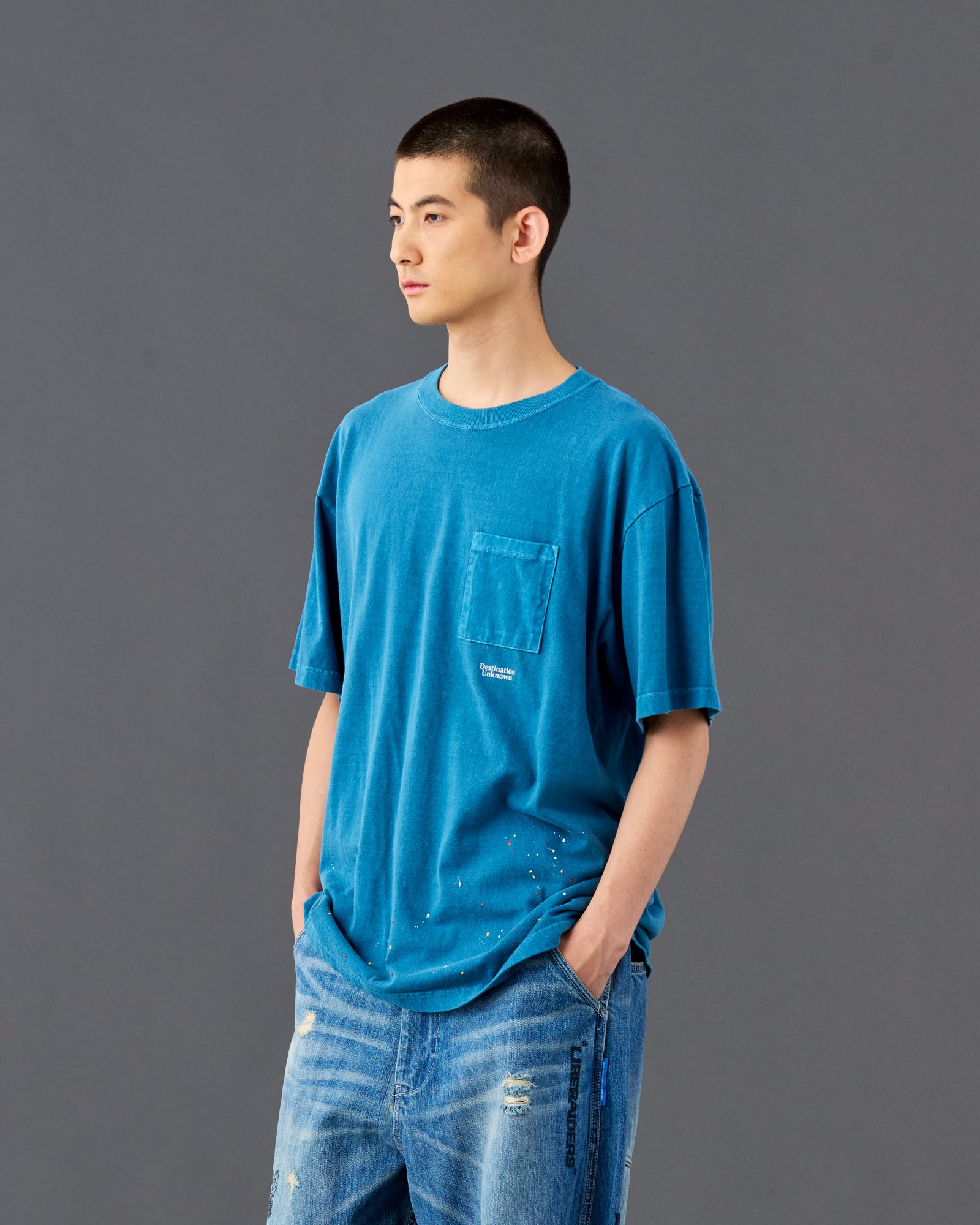 A Eckhaus Latta Shirt pictured on a model in front of a white background. The title of the product is Eckhaus Latta Eclipse Turtleneck - Stone and the image was taken by 199A®.