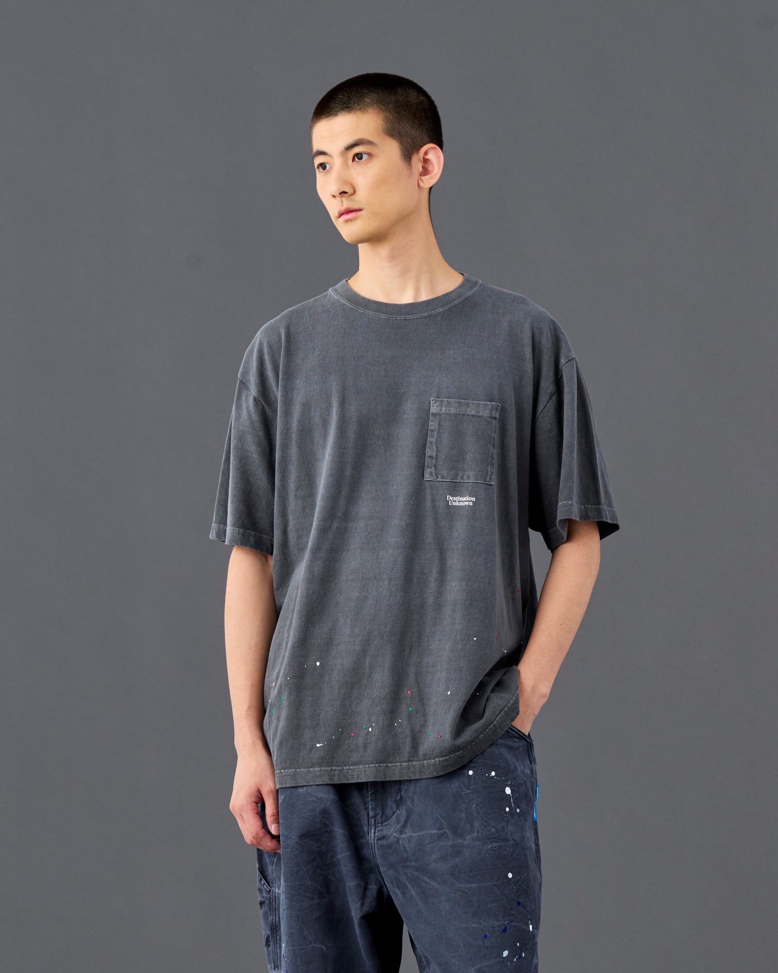 A Eckhaus Latta Shirt pictured on a model in front of a white background. The title of the product is Eckhaus Latta Eclipse Turtleneck - Stone and the image was taken by 199A®.