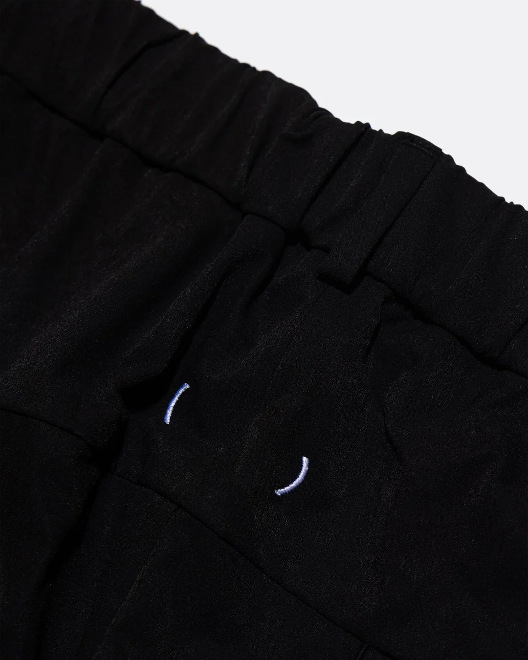 A Eckhaus Latta Shirt pictured on a model in front of a white background. The title of the product is Eckhaus Latta Eclipse Turtleneck - Stone and the image was taken by 199A®.