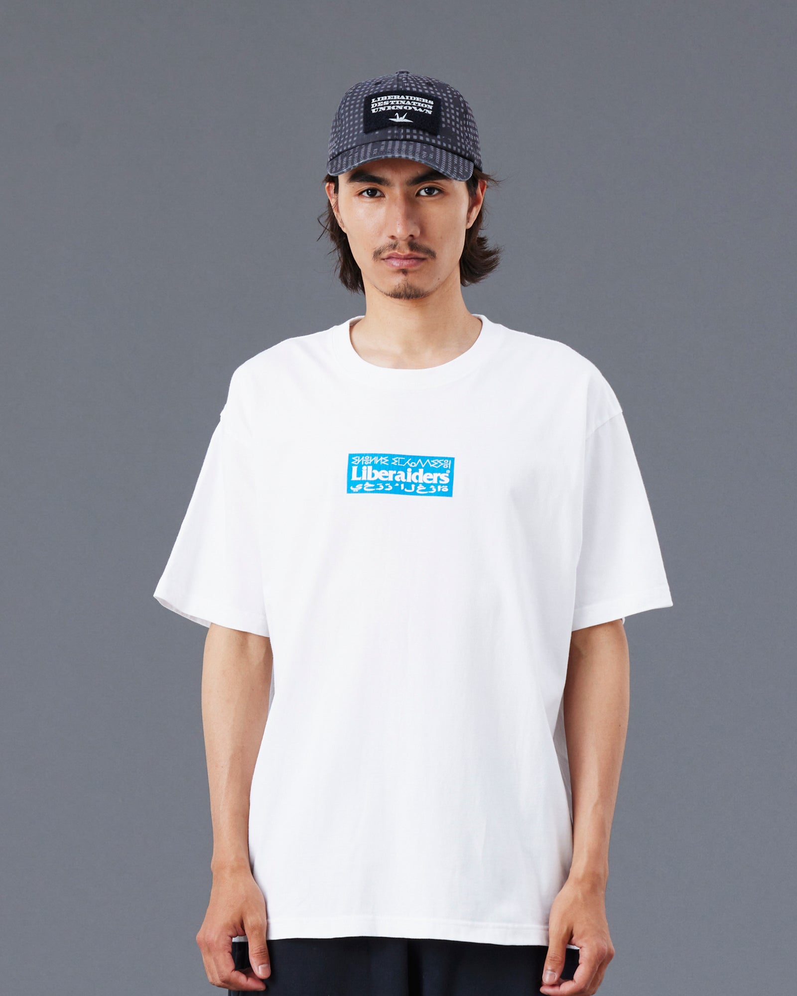A Eckhaus Latta Shirt pictured on a model in front of a white background. The title of the product is Eckhaus Latta Eclipse Turtleneck - Stone and the image was taken by 199A®.