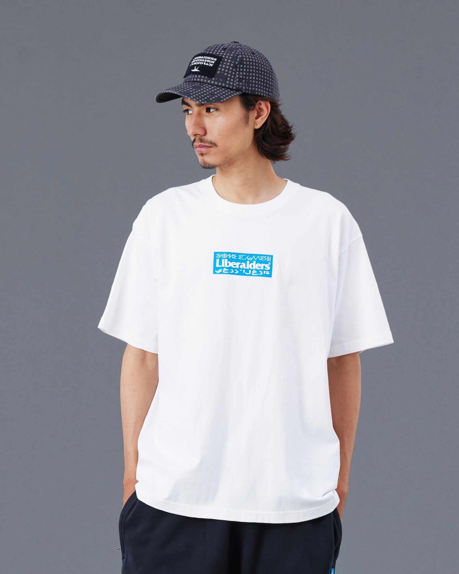 A Eckhaus Latta Shirt pictured on a model in front of a white background. The title of the product is Eckhaus Latta Eclipse Turtleneck - Stone and the image was taken by 199A®.