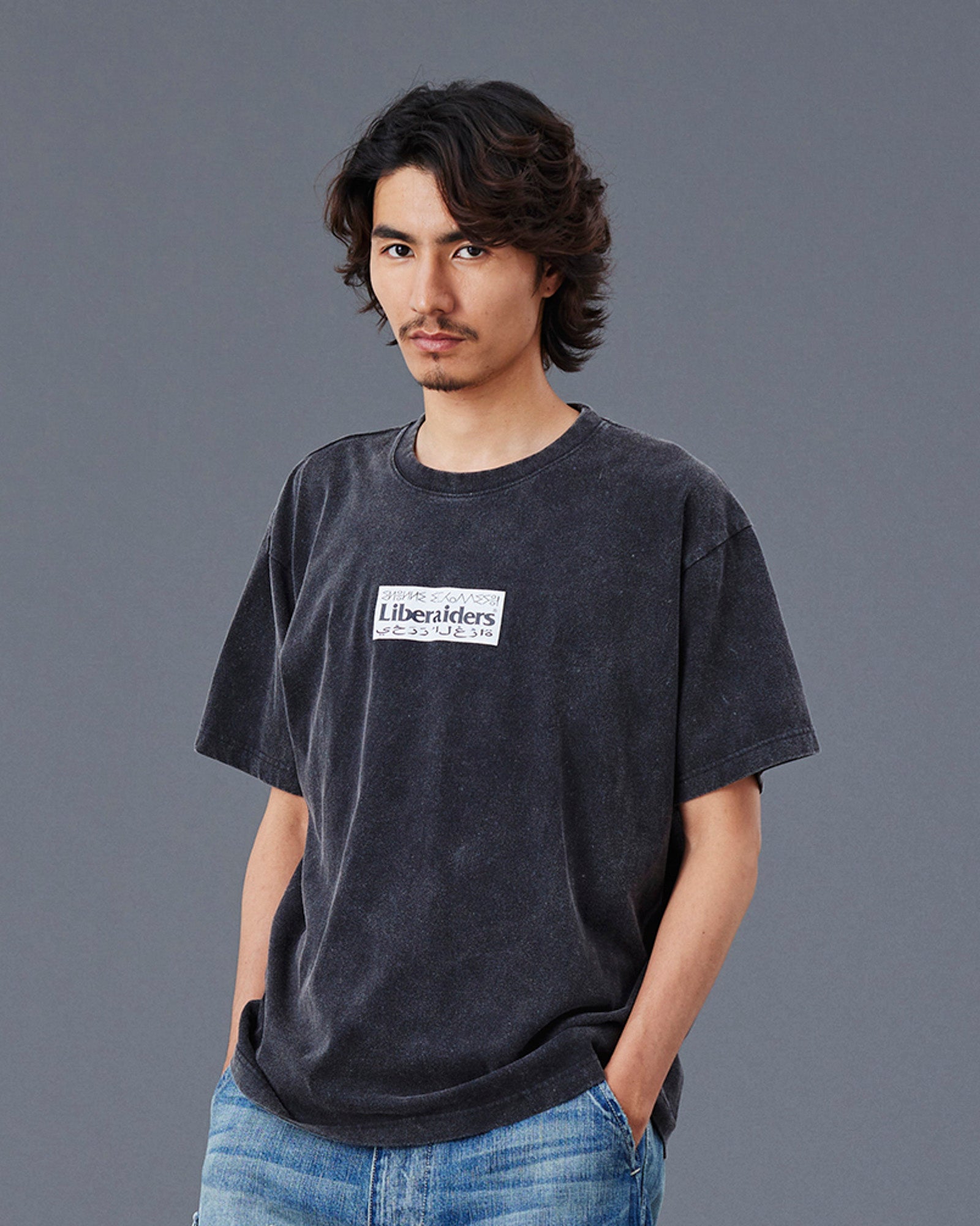 A Eckhaus Latta Shirt pictured on a model in front of a white background. The title of the product is Eckhaus Latta Eclipse Turtleneck - Stone and the image was taken by 199A®.