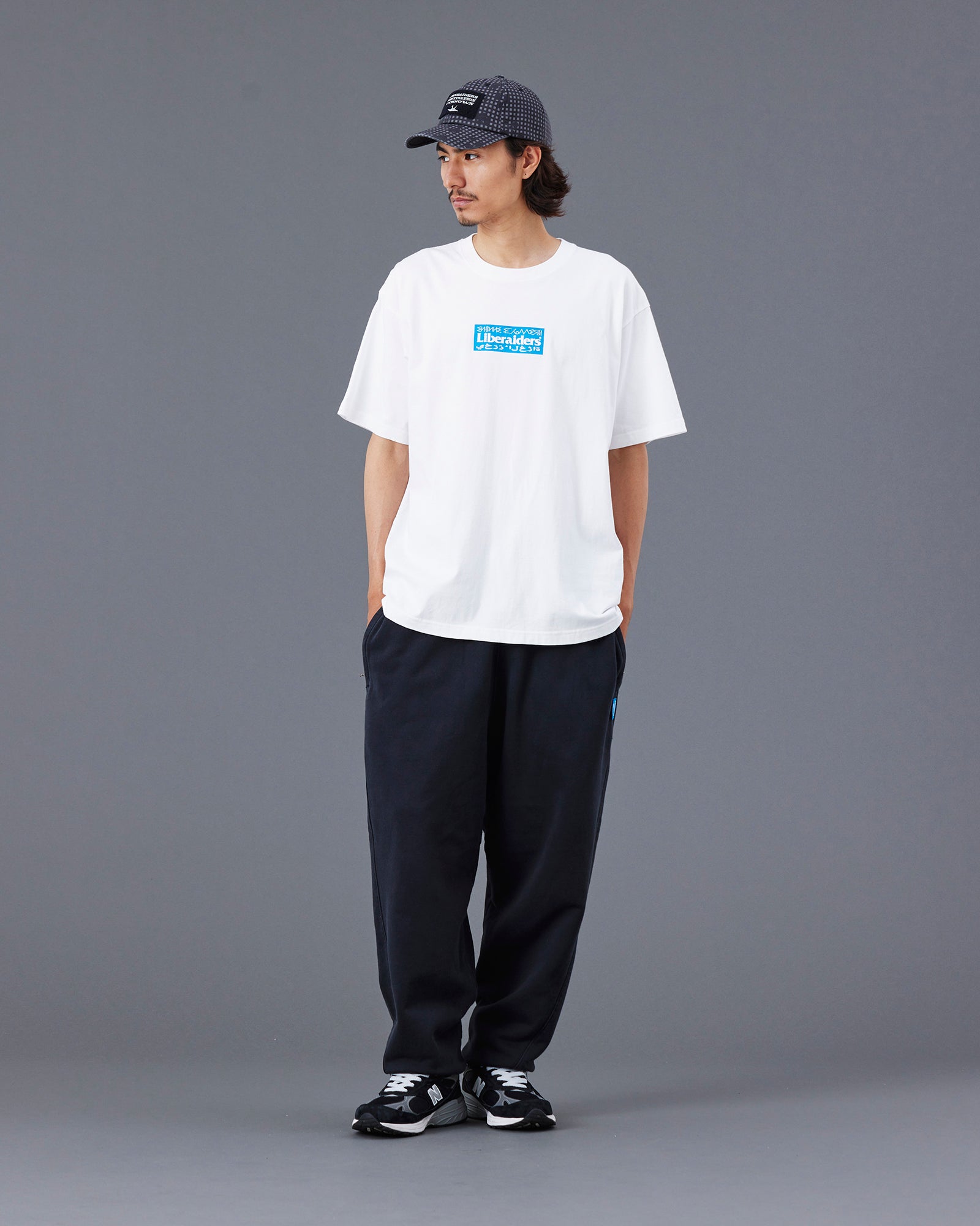 A Eckhaus Latta Shirt pictured on a model in front of a white background. The title of the product is Eckhaus Latta Eclipse Turtleneck - Stone and the image was taken by 199A®.