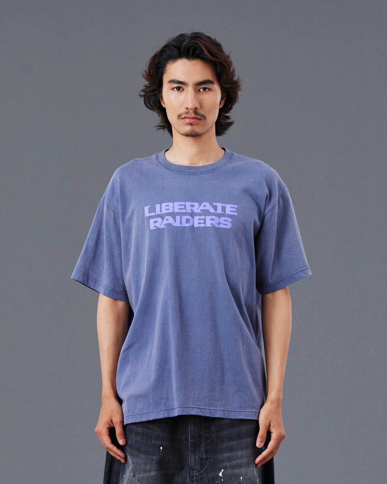 A Eckhaus Latta Shirt pictured on a model in front of a white background. The title of the product is Eckhaus Latta Eclipse Turtleneck - Stone and the image was taken by 199A®.