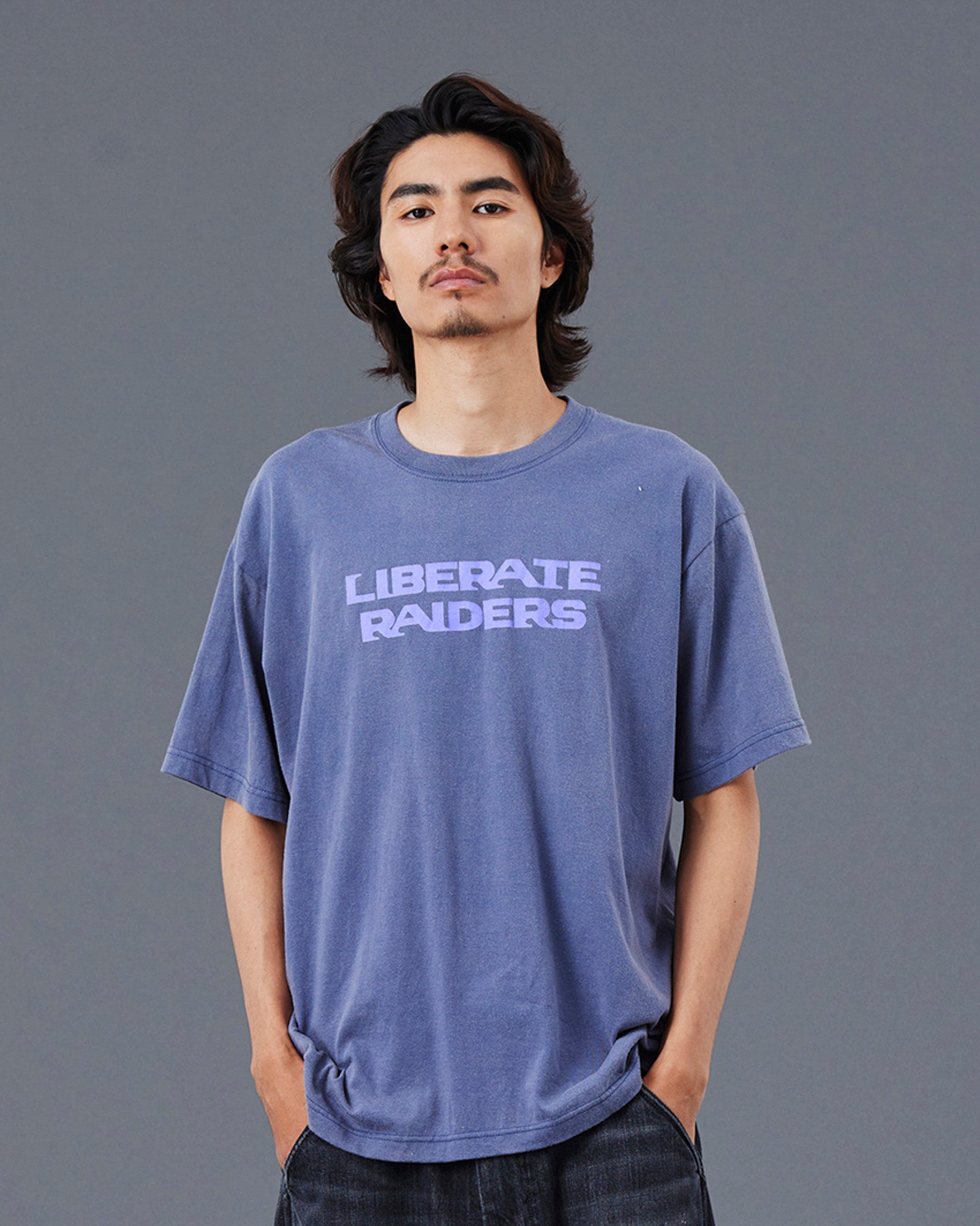 A Eckhaus Latta Shirt pictured on a model in front of a white background. The title of the product is Eckhaus Latta Eclipse Turtleneck - Stone and the image was taken by 199A®.