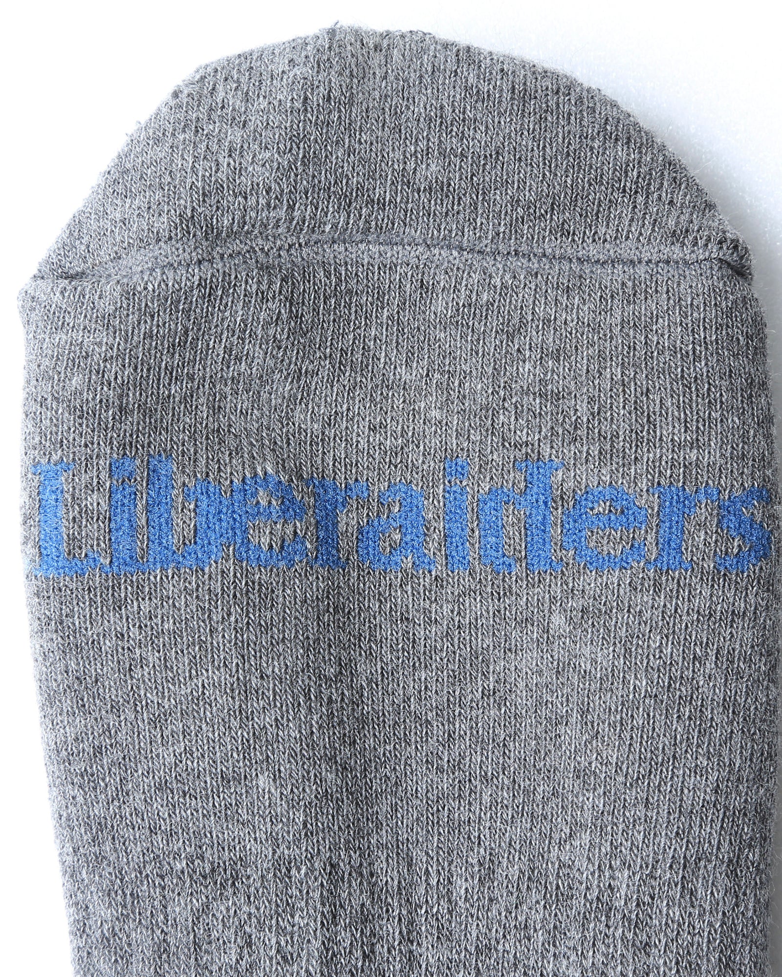 A Eckhaus Latta Shirt pictured on a model in front of a white background. The title of the product is Eckhaus Latta Eclipse Turtleneck - Stone and the image was taken by 199A®.