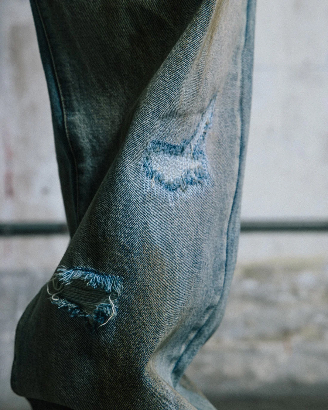 A Eckhaus Latta Shirt pictured on a model in front of a white background. The title of the product is Eckhaus Latta Eclipse Turtleneck - Stone and the image was taken by 199A®.