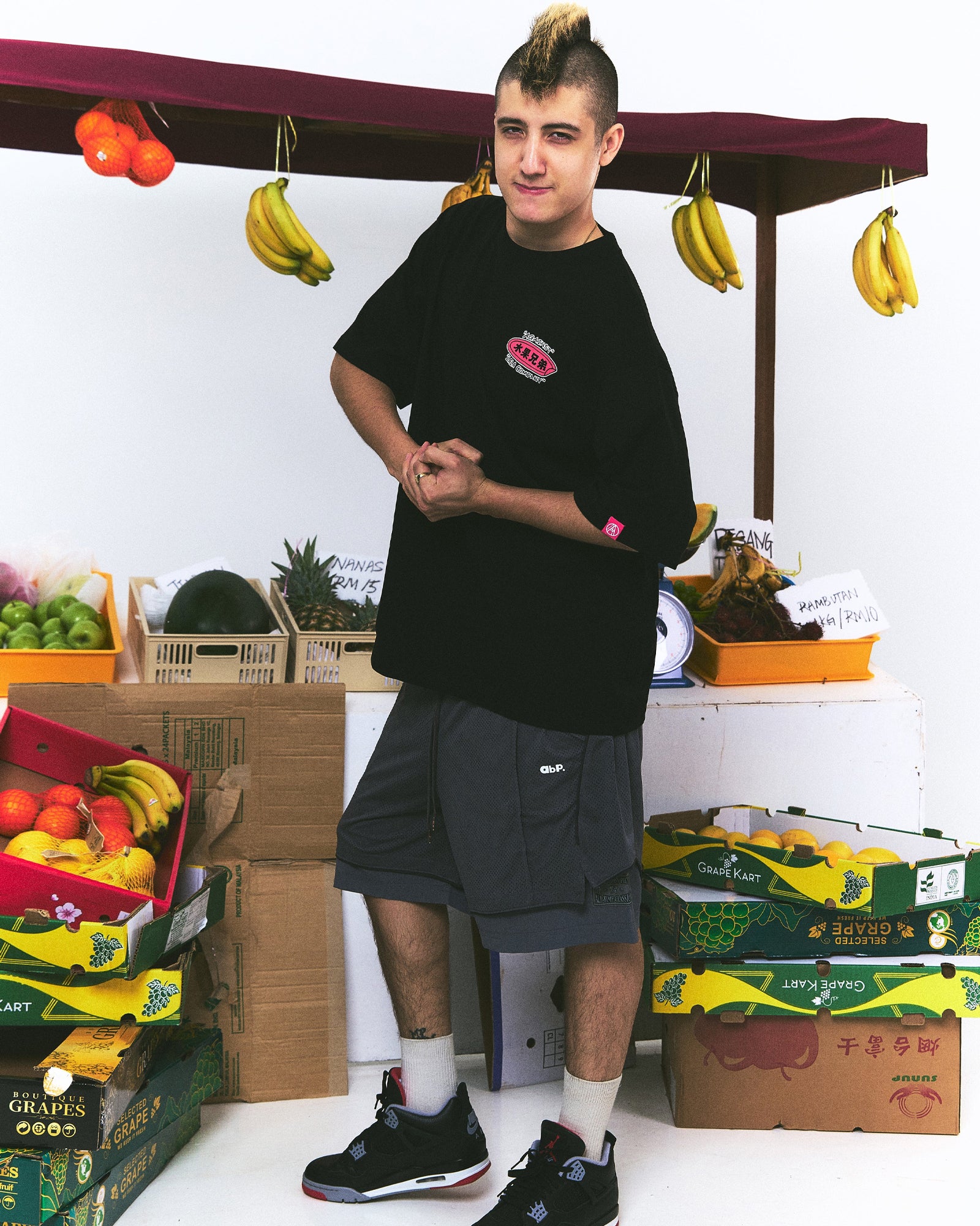 A Eckhaus Latta Shirt pictured on a model in front of a white background. The title of the product is Eckhaus Latta Eclipse Turtleneck - Stone and the image was taken by 199A®.