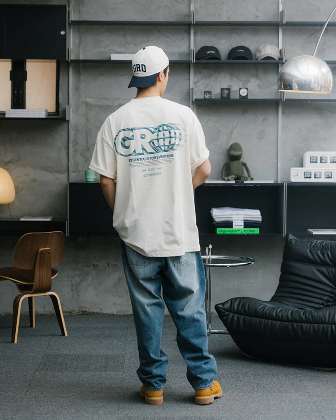 A Eckhaus Latta Shirt pictured on a model in front of a white background. The title of the product is Eckhaus Latta Eclipse Turtleneck - Stone and the image was taken by 199A®.