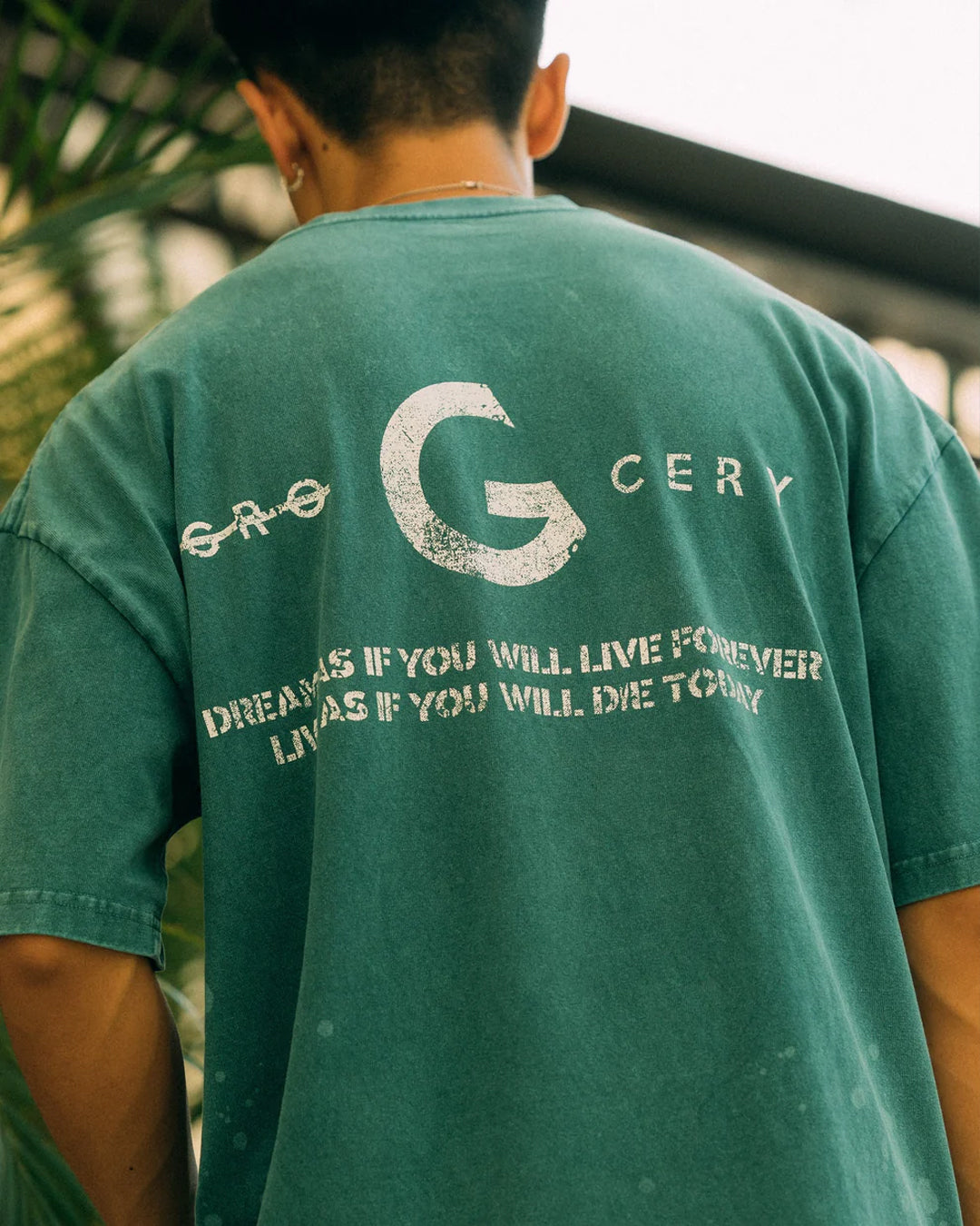 A Eckhaus Latta Shirt pictured on a model in front of a white background. The title of the product is Eckhaus Latta Eclipse Turtleneck - Stone and the image was taken by 199A®.