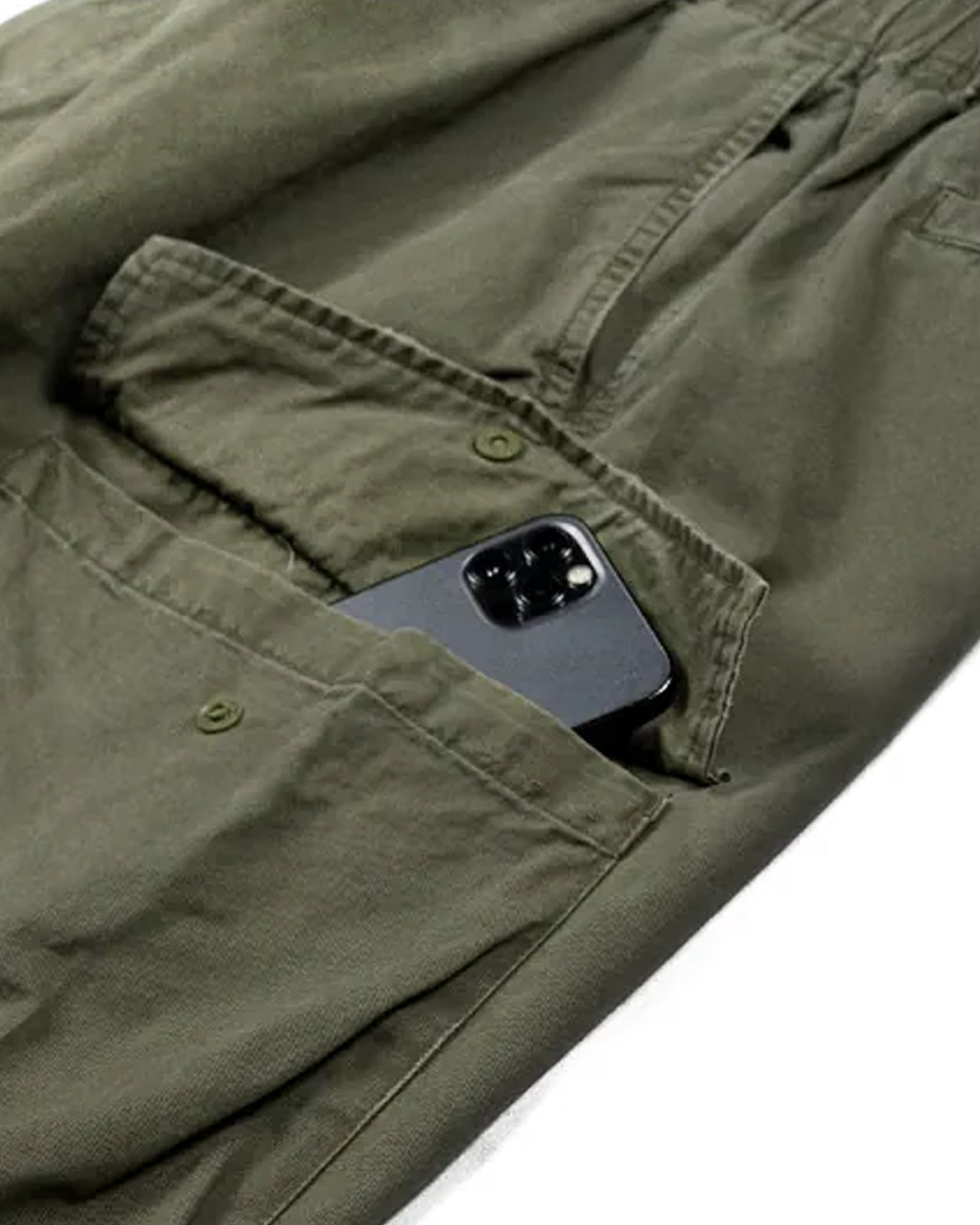 A Eckhaus Latta Shirt pictured on a model in front of a white background. The title of the product is Eckhaus Latta Eclipse Turtleneck - Stone and the image was taken by 199A®.