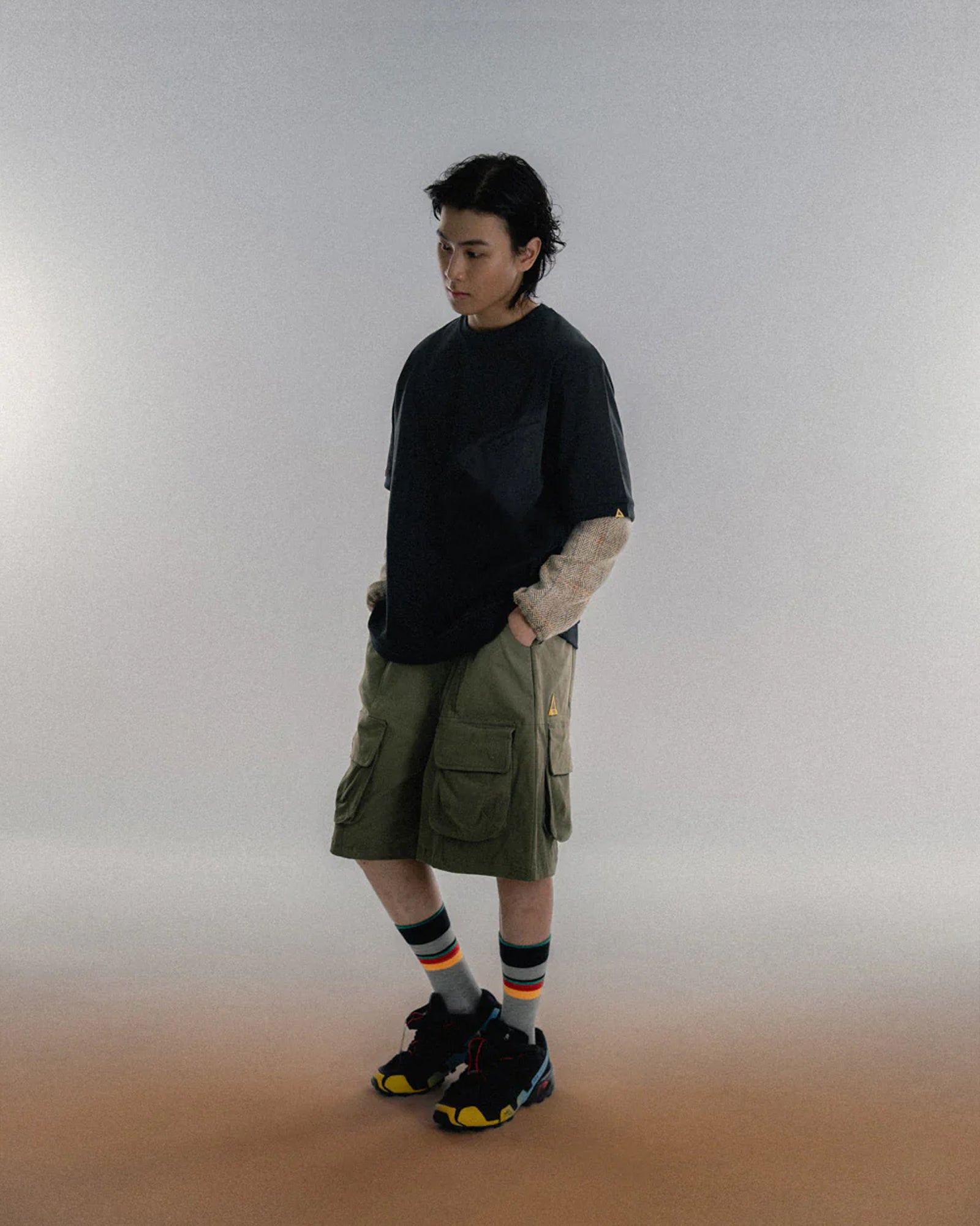 A Eckhaus Latta Shirt pictured on a model in front of a white background. The title of the product is Eckhaus Latta Eclipse Turtleneck - Stone and the image was taken by 199A®.