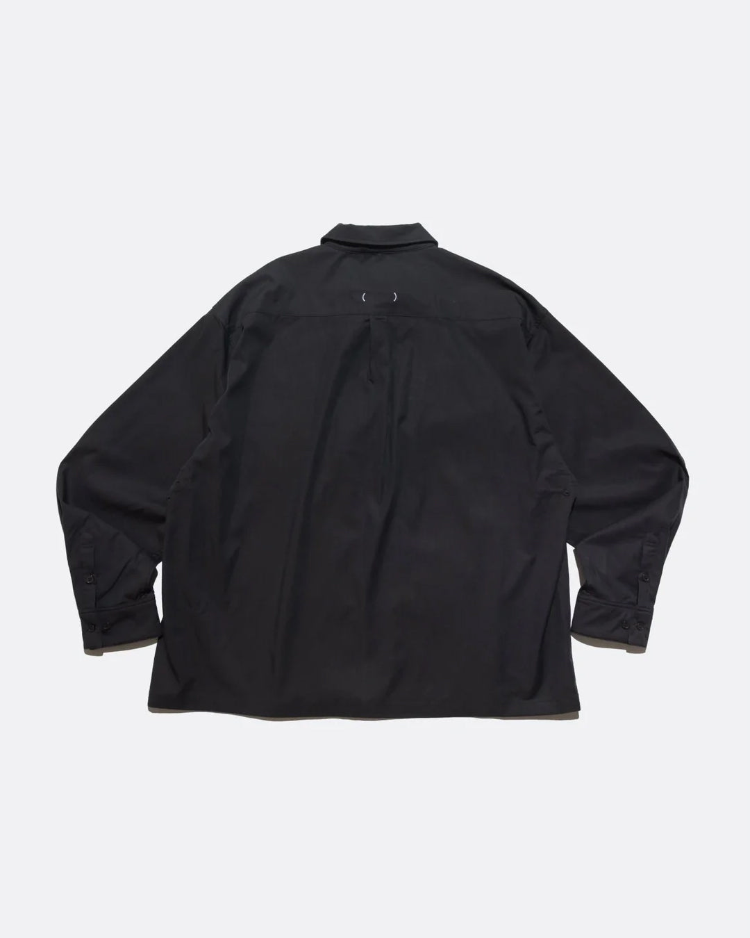 A Eckhaus Latta Shirt pictured on a model in front of a white background. The title of the product is Eckhaus Latta Eclipse Turtleneck - Stone and the image was taken by 199A®.