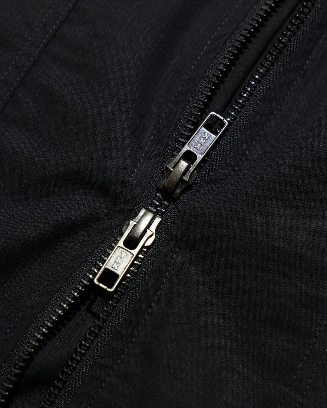 A Eckhaus Latta Shirt pictured on a model in front of a white background. The title of the product is Eckhaus Latta Eclipse Turtleneck - Stone and the image was taken by 199A®.