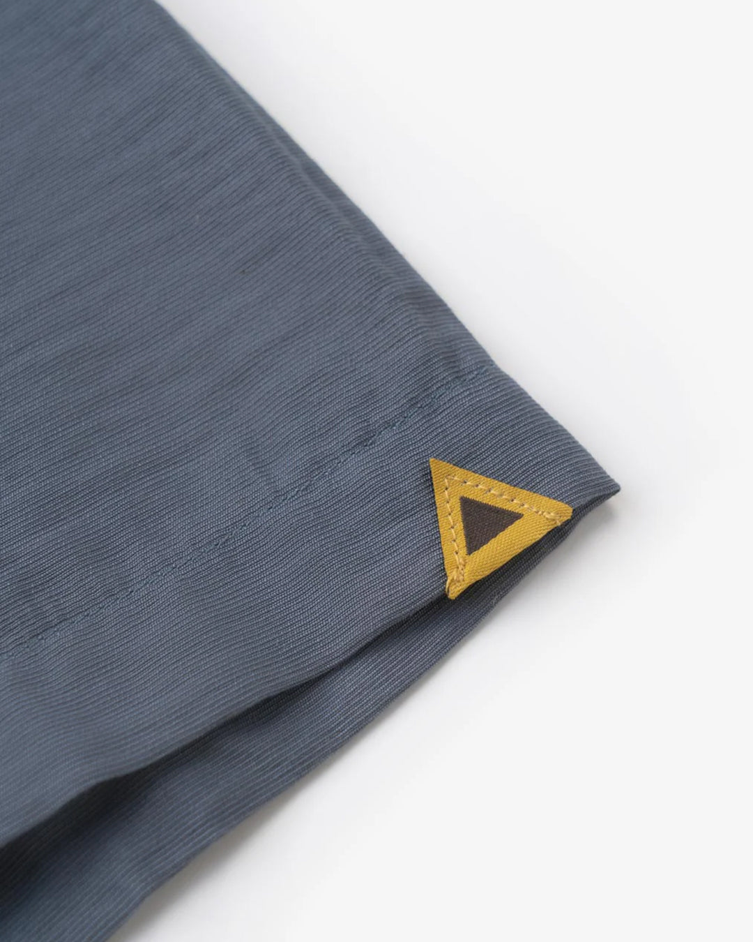 A Eckhaus Latta Shirt pictured on a model in front of a white background. The title of the product is Eckhaus Latta Eclipse Turtleneck - Stone and the image was taken by 199A®.