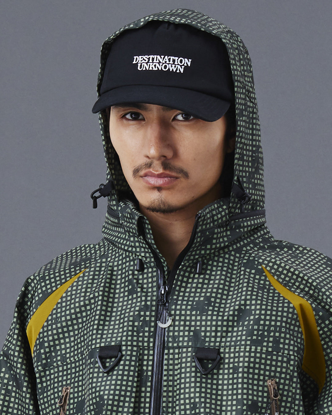 A Eckhaus Latta Shirt pictured on a model in front of a white background. The title of the product is Eckhaus Latta Eclipse Turtleneck - Stone and the image was taken by 199A®.