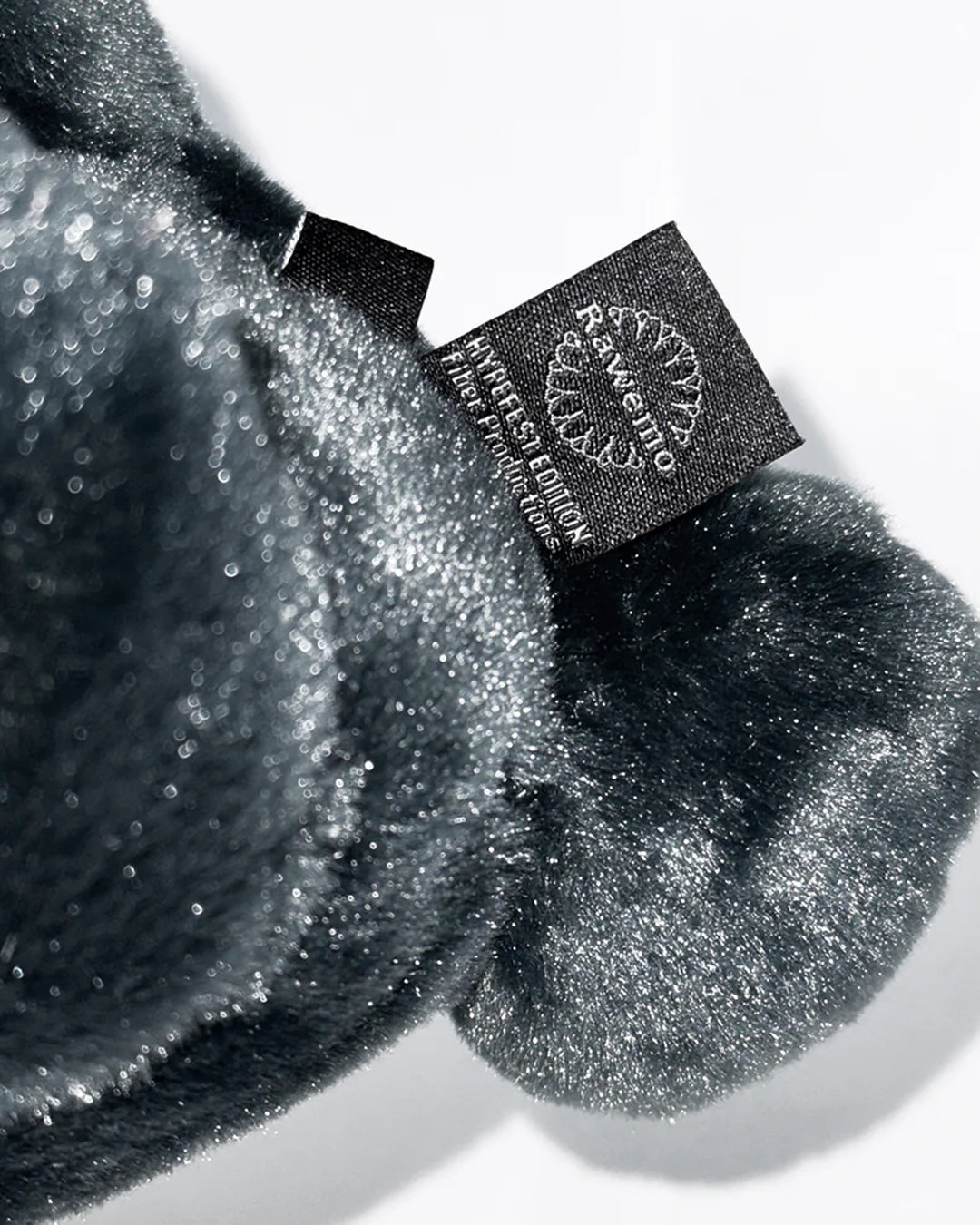 A Eckhaus Latta Shirt pictured on a model in front of a white background. The title of the product is Eckhaus Latta Eclipse Turtleneck - Stone and the image was taken by 199A®.