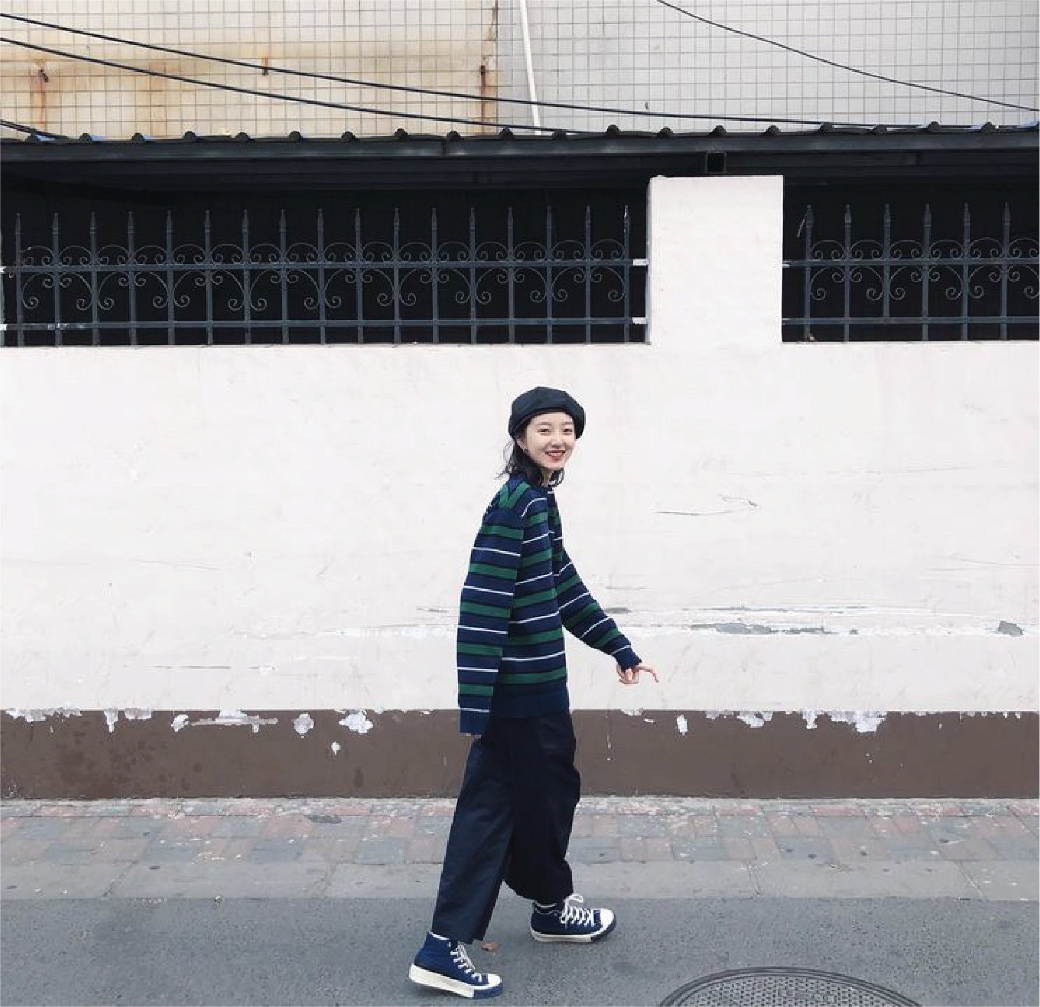 A Eckhaus Latta Shirt pictured on a model in front of a white background. The title of the product is Eckhaus Latta Eclipse Turtleneck - Stone and the image was taken by 199A®.