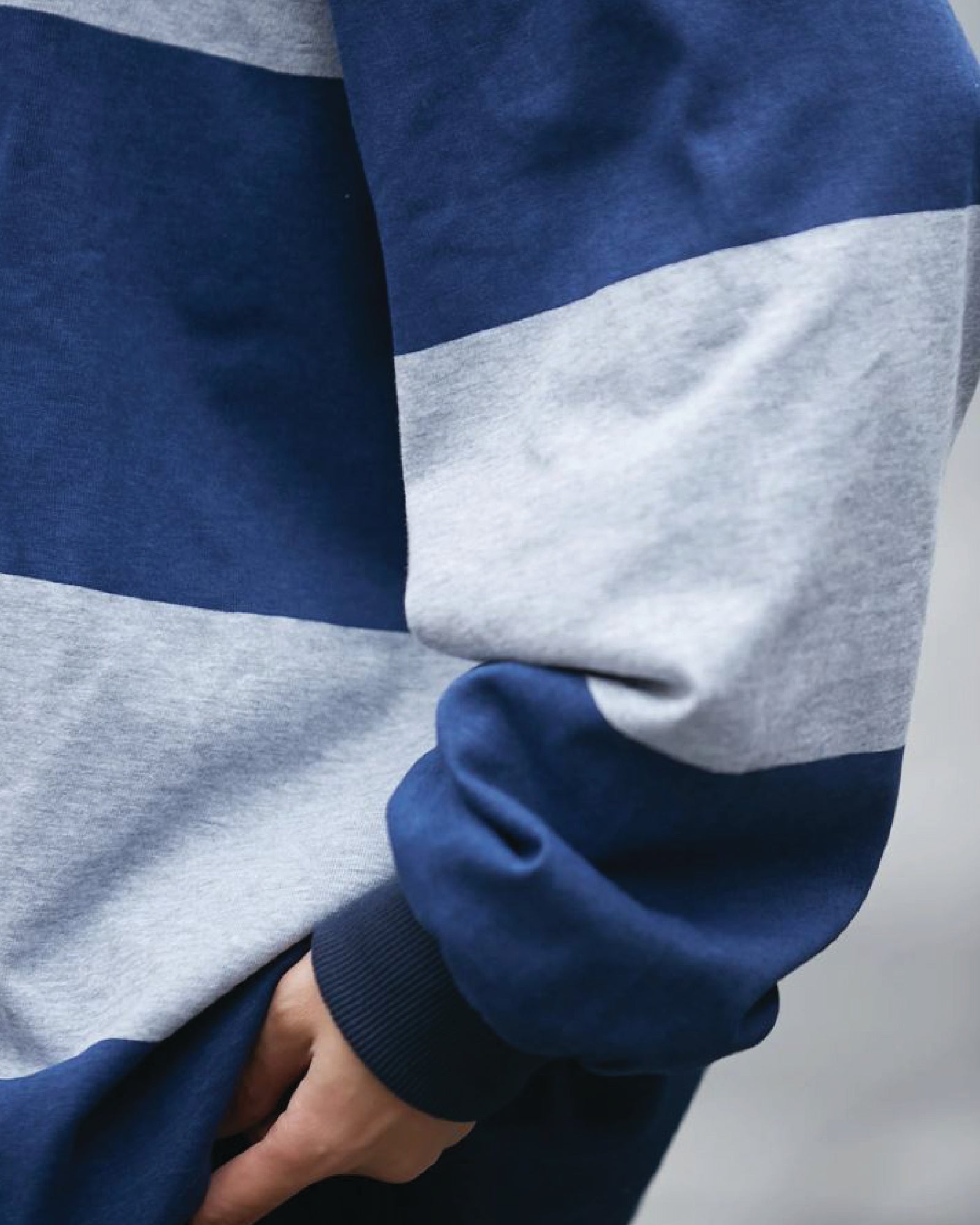 A Eckhaus Latta Shirt pictured on a model in front of a white background. The title of the product is Eckhaus Latta Eclipse Turtleneck - Stone and the image was taken by 199A®.