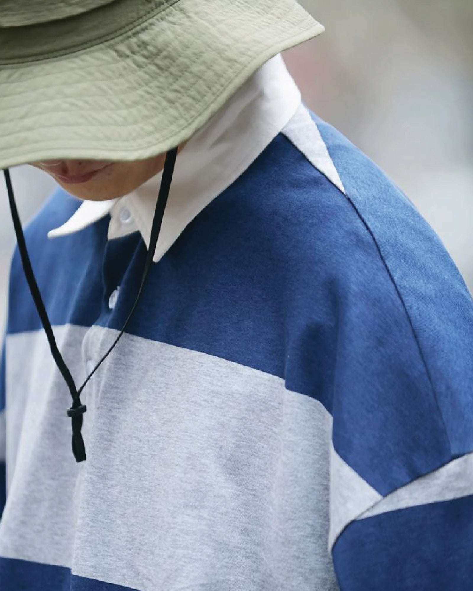 A Eckhaus Latta Shirt pictured on a model in front of a white background. The title of the product is Eckhaus Latta Eclipse Turtleneck - Stone and the image was taken by 199A®.
