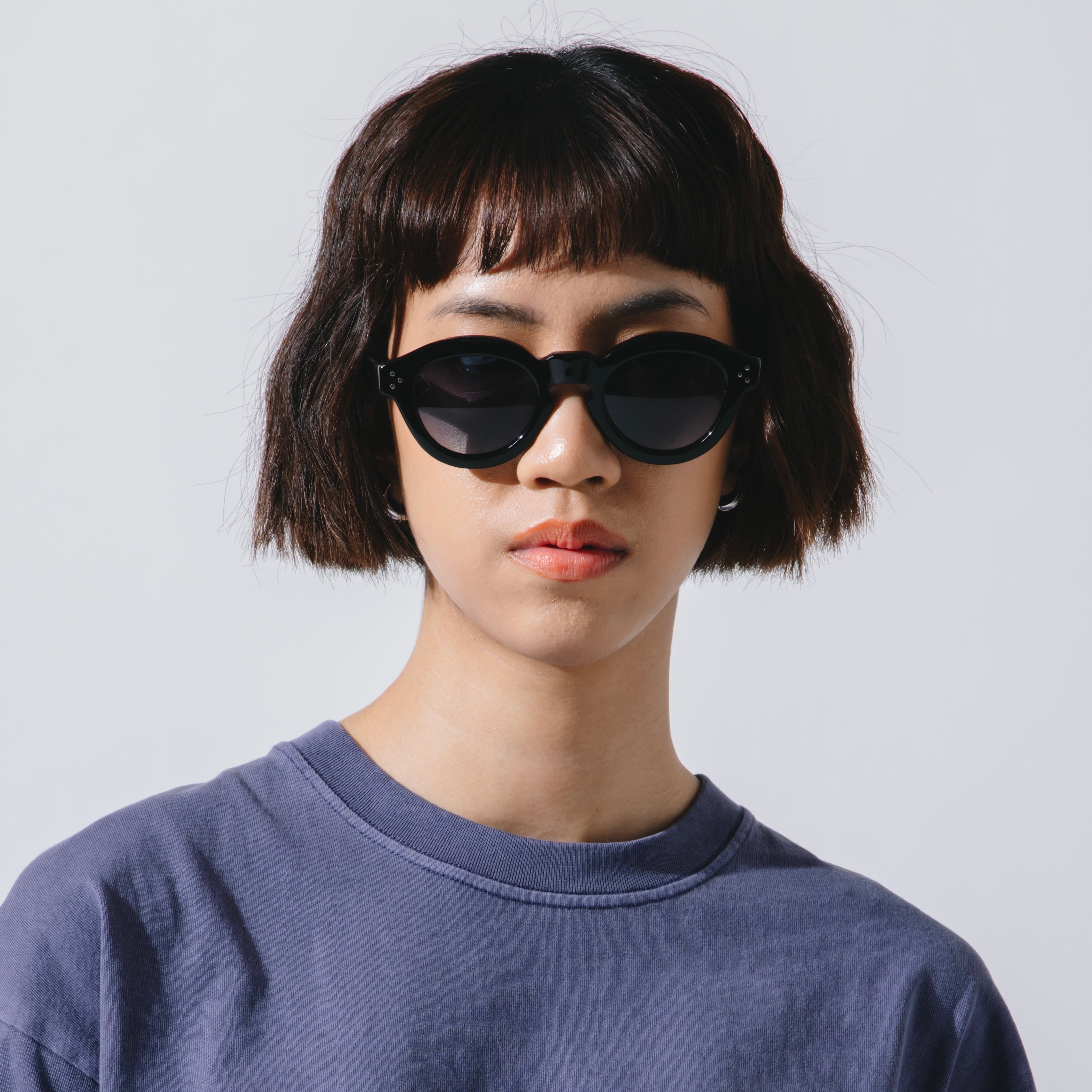 A Eckhaus Latta Shirt pictured on a model in front of a white background. The title of the product is Eckhaus Latta Eclipse Turtleneck - Stone and the image was taken by 199A®.