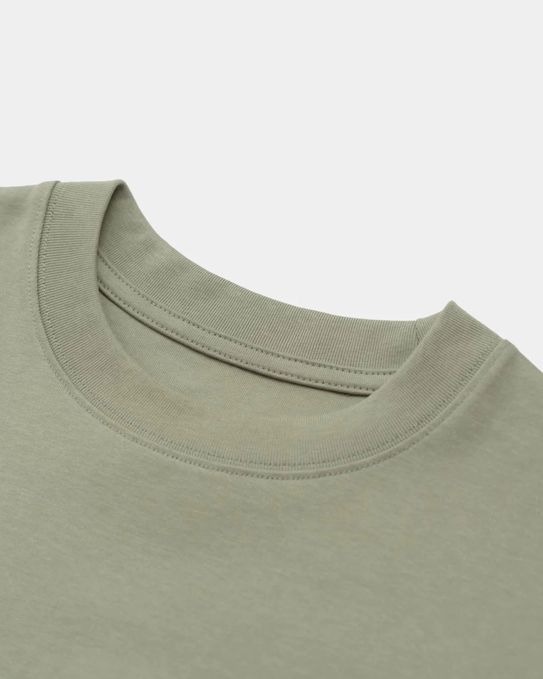 A Eckhaus Latta Shirt pictured on a model in front of a white background. The title of the product is Eckhaus Latta Eclipse Turtleneck - Stone and the image was taken by 199A®.