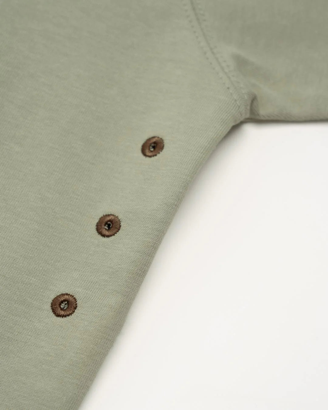 A Eckhaus Latta Shirt pictured on a model in front of a white background. The title of the product is Eckhaus Latta Eclipse Turtleneck - Stone and the image was taken by 199A®.